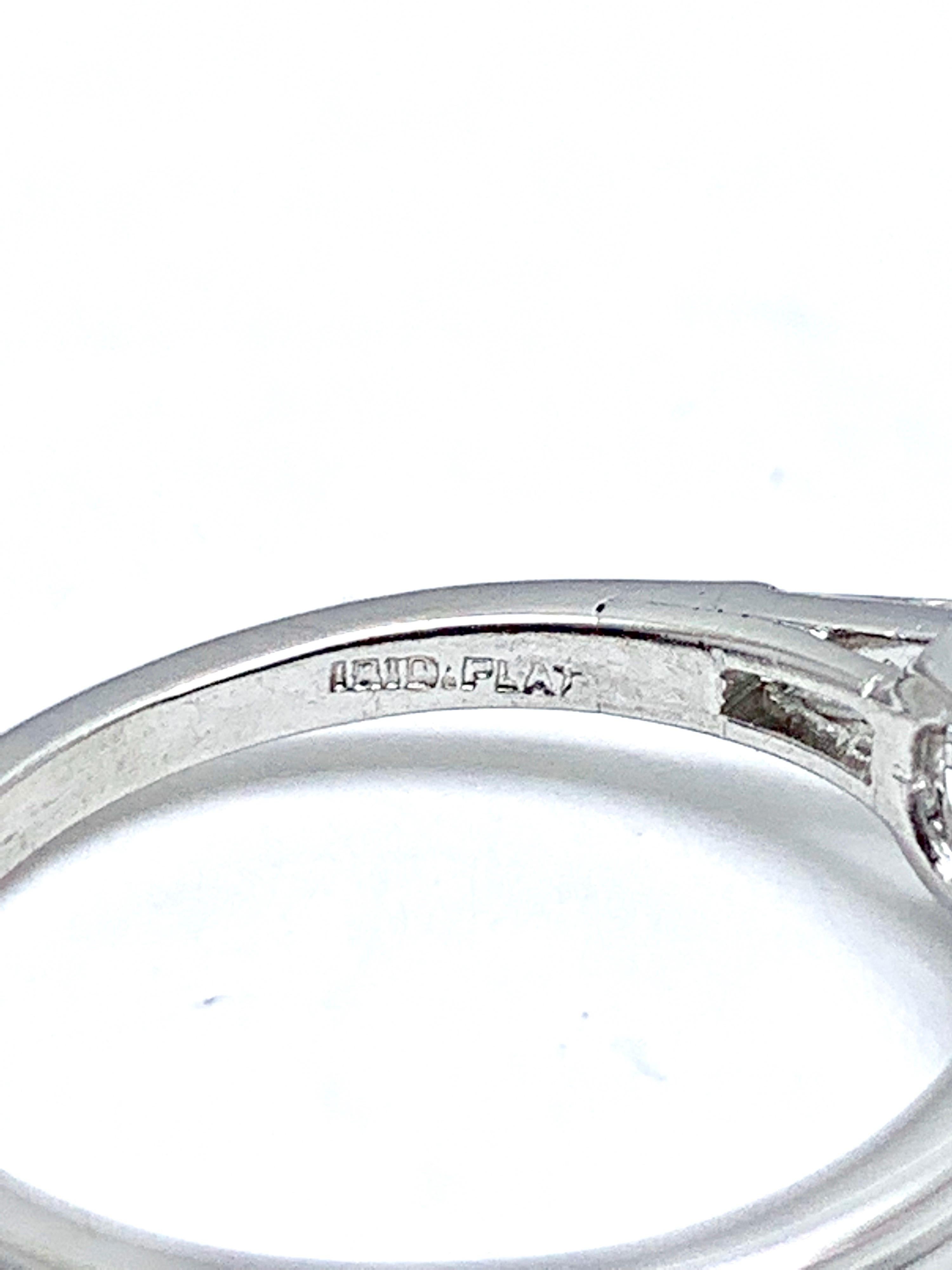 Modern Tiffany & Co. 1.05 Carat E/VS1 Round Brilliant and Baguette Diamond Plat Ring