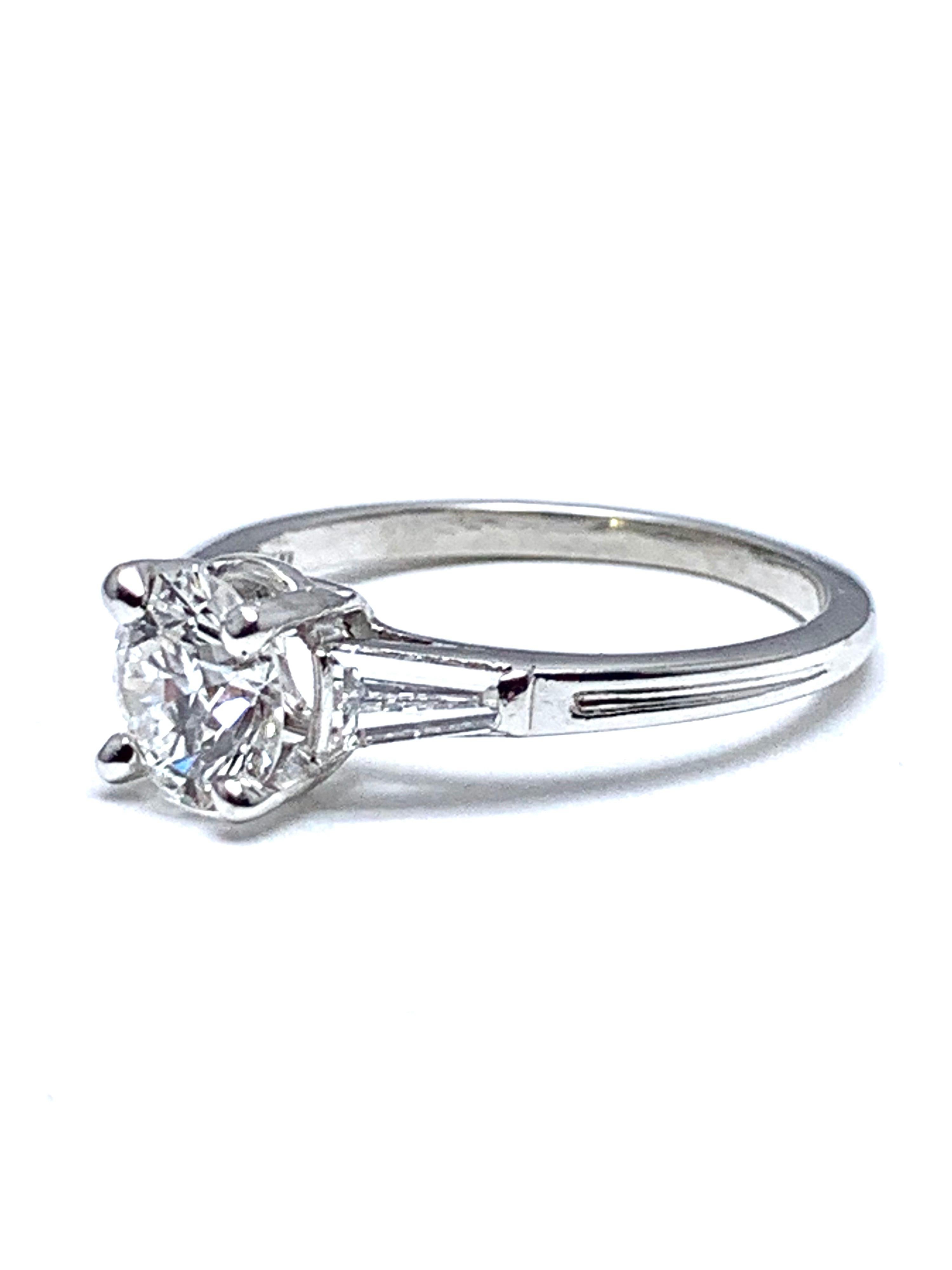 Tiffany & Co. 1.05 Carat E/VS1 Round Brilliant and Baguette Diamond Plat Ring In Excellent Condition In Chevy Chase, MD