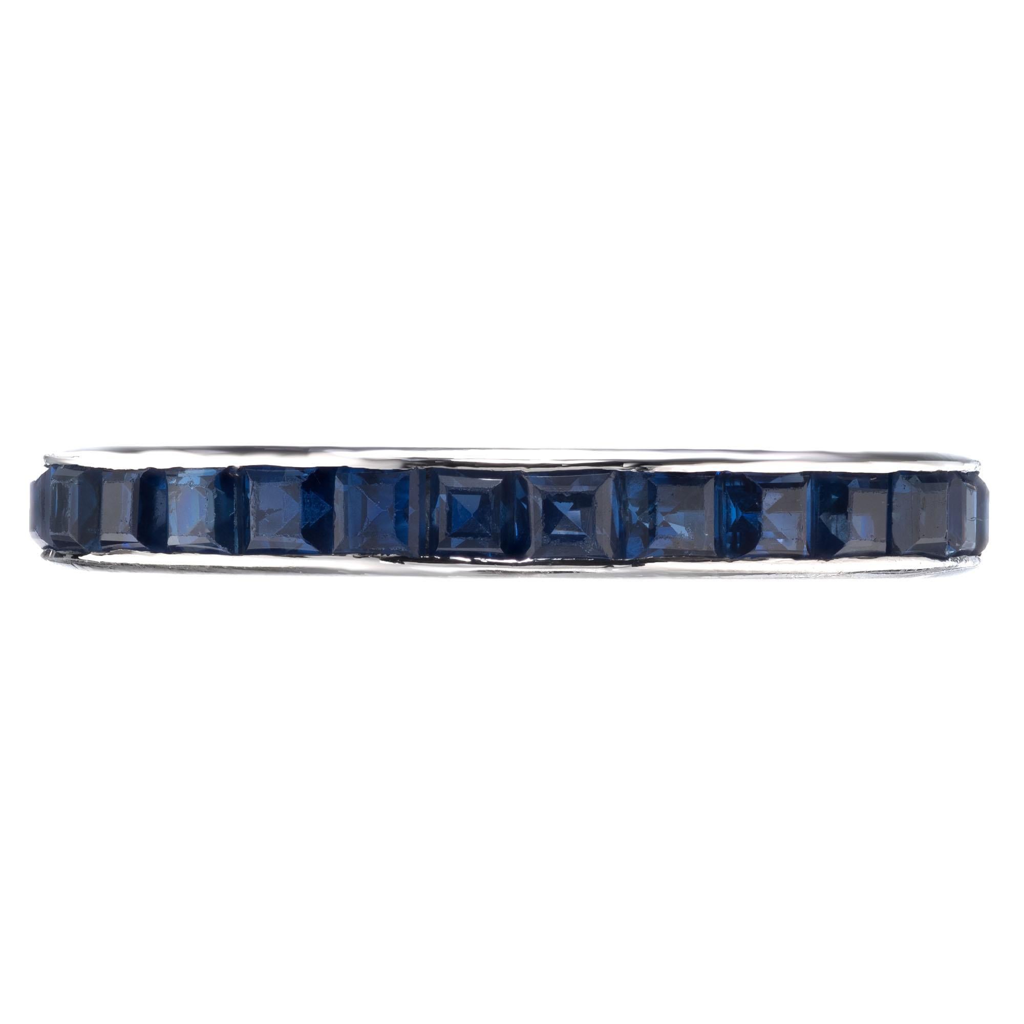 Square sapphire Eternity wedding band ring, set in platinum. 

28 square step cut blue sapphires, approx. 1.12cts
Size 6 and not sizable 
Platinum 
Stamped: IRID PLAT
Hallmark: Tiffany+Co
2.9 grams
Width at top: 2.8mm
Height at top: 1.9mm
Width at