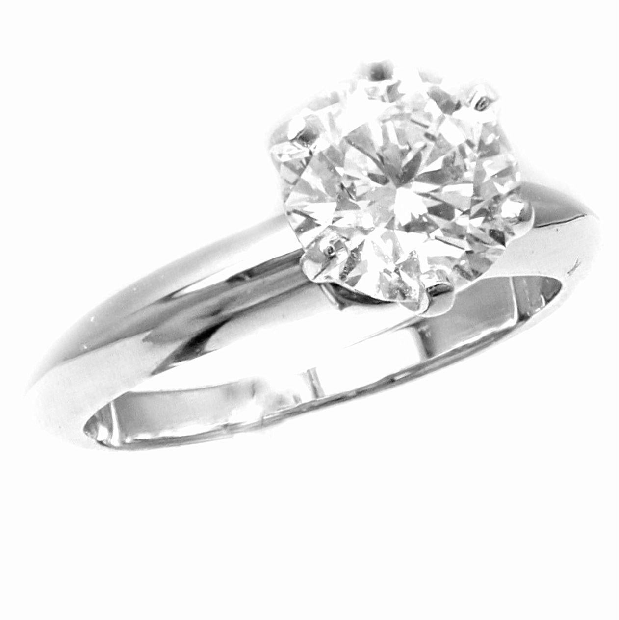 Platinum Diamond Engagement Ring by Tiffany & Co. 
With 1x Diamond
1.13ct clarity VS1, color H
Cut: Excellent
Polish: Excellent
Symmetry: Excellent
Fluorescence: NONE
Includes Tiffany & Co Diamond Certificate and a Box.
Details:
Ring Size: 5, Resize