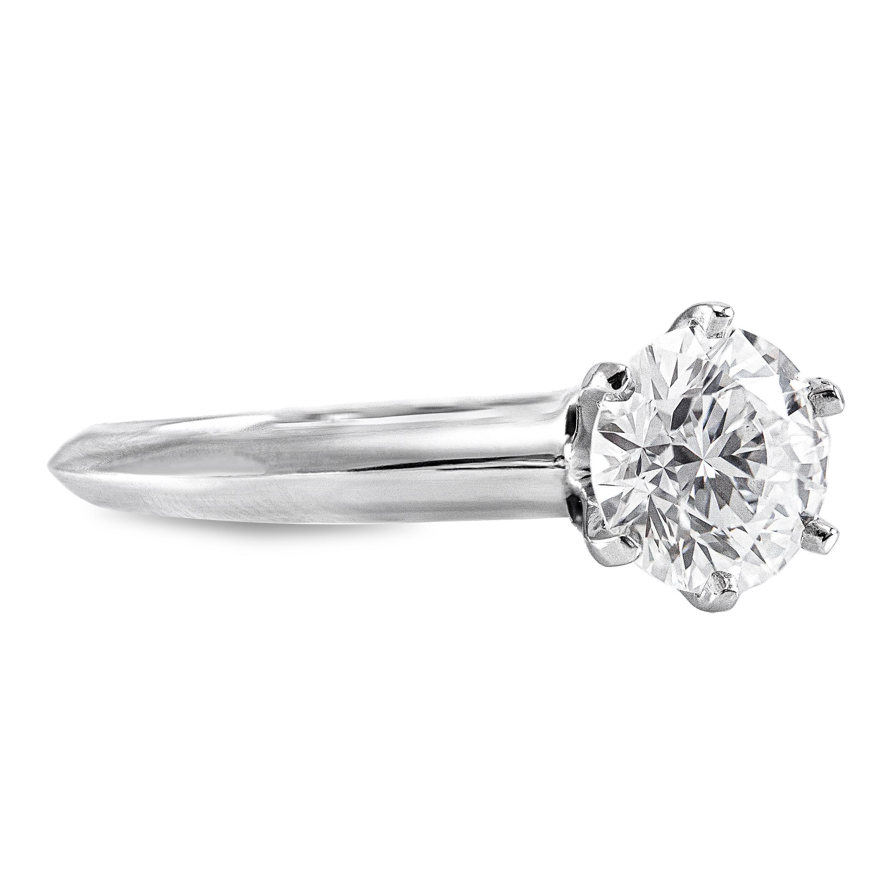Classic Tiffany & Co Solitaire Diamond Platinum Engagement Ring

Center diamond 1.14ct F, VS1 GIA certified GIA # 12657480
The diamond is ideal-cut (Excellent in Cut, Polish & Symmetry)
6-prong Tiffany setting
Set in Platinum 950 
Signed and