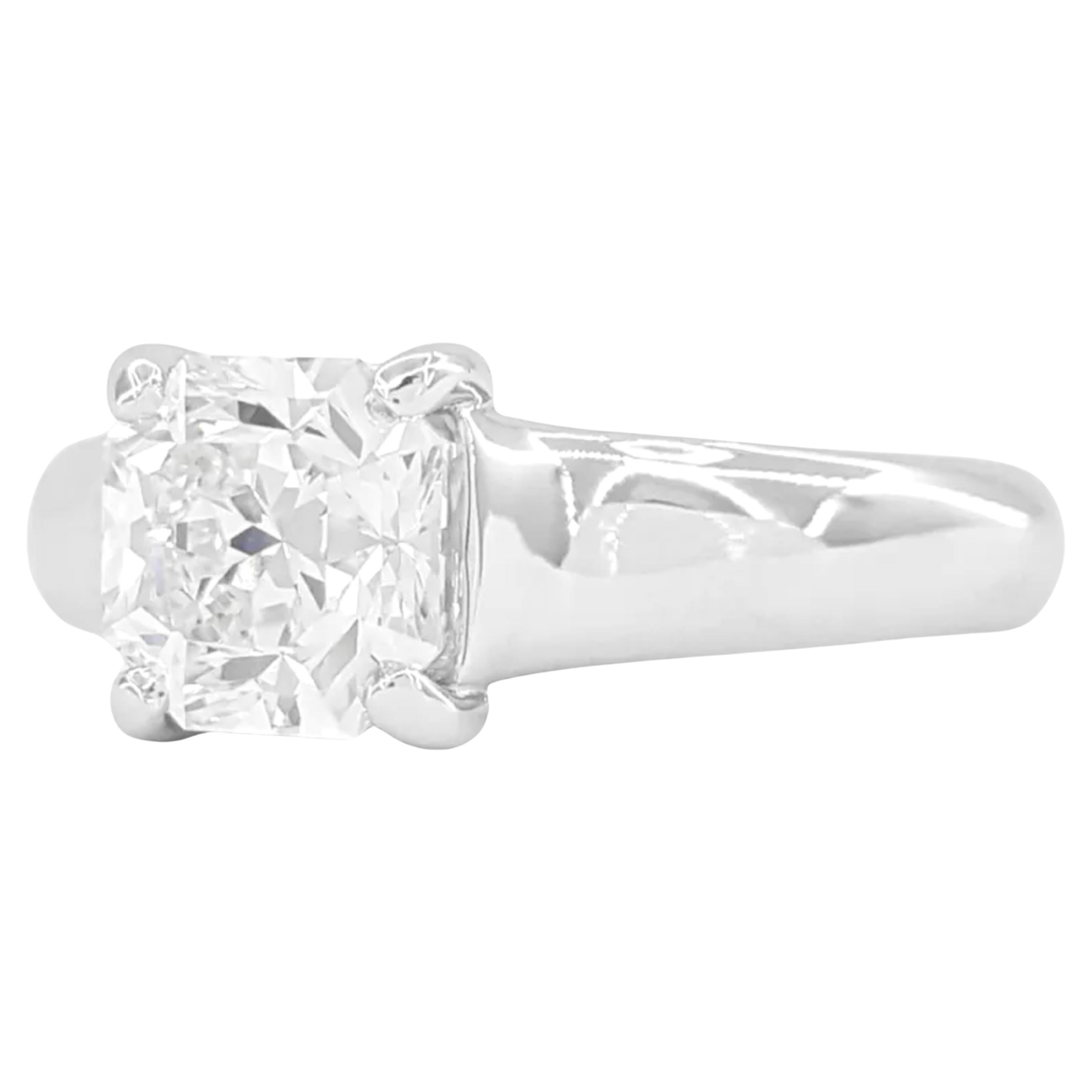 Tiffany & Co. engagement ring you described features a 1.17 carat Lucida Square Brilliant Cut diamond, which is a unique cut exclusive to Tiffany & Co. The diamond has a G color rating, indicating it is near colorless, and enjoys an Internally