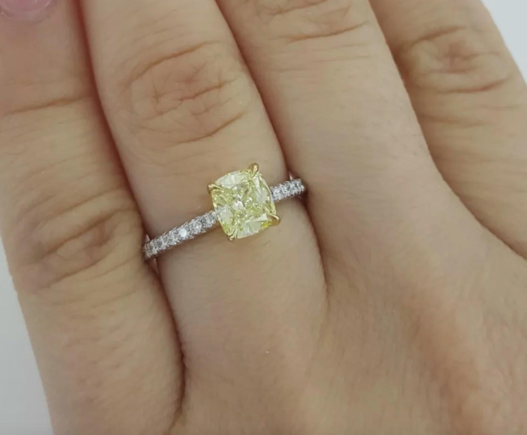 Diamond cut: Cushion Brilliant 
Carat: 1.03 carats
Measurements: 6.03 x 5.52 x 3.68 mm
Color: Fancy Intense Yellow
Clarity: VS1
Polish: Excellent
Symmetry: Very Good
Fluorescence: Faint
Inscription: T&Co. (Serial number) on crown 

Small