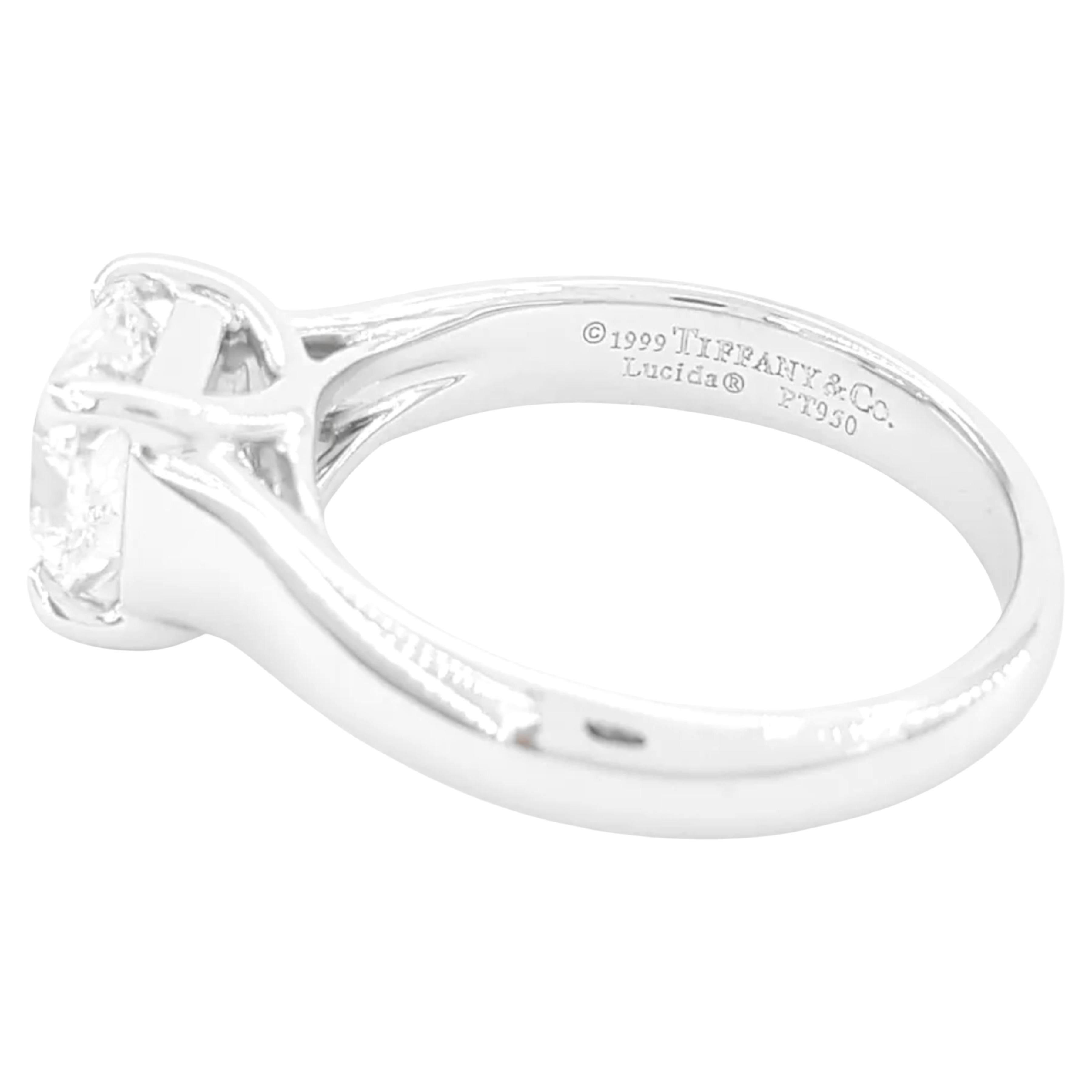 Tiffany & Co. engagement ring you've described features a 1.19 carat Lucida Square Brilliant Cut diamond, a specialty cut exclusive to Tiffany & Co. This diamond has a G color rating, indicating it is near colorless, and a VVS1 clarity grade,