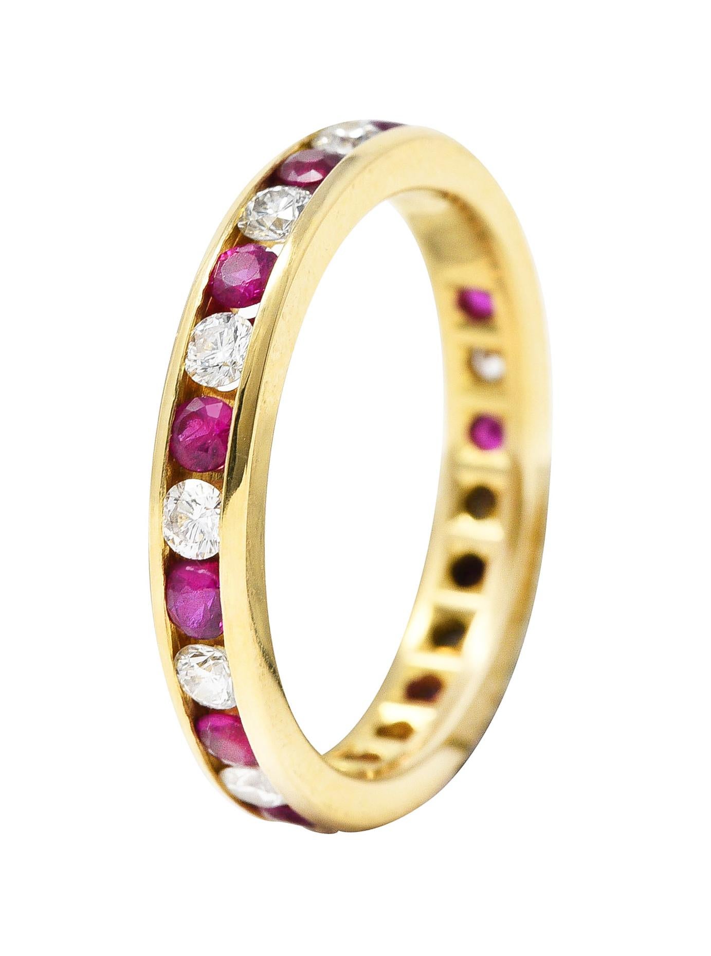 Featuring round brilliant cut diamonds alternating with round cut rubies - channel set fully around. Diamonds weigh approximately 0.52 carat total - G/H color with VS clarity. Rubies weigh approximately 0.68 carat total - transparent bright red in