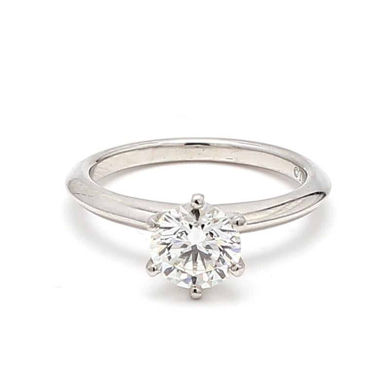 Designer:
Tiffany & Co


Title:
Tiffany & Co 1.20 Carat Round Brilliant H VVS2 Diamond Platinum Engagement Ring


Style:
Engagement


Metal:
Platinum


Gemstone 1:
1.2 Carat Diamond


Number of Stones:
1


Color:
H


Clarity:
VVS2


Shape:
Round