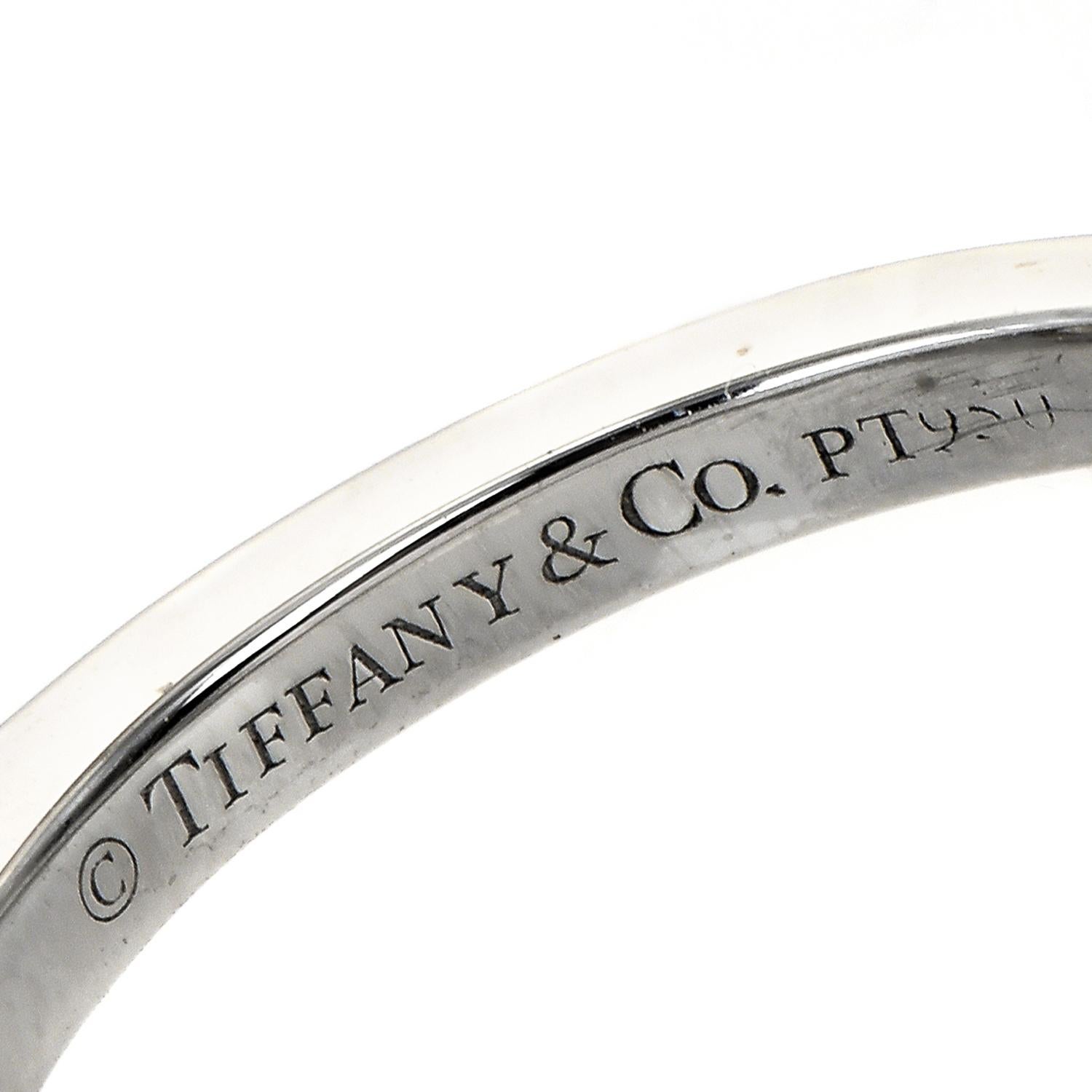 Verlobungsring mit 1,23 Karat Diamant und blauem Saphir aus Platin mit Halo von Tiffany & Co. 2