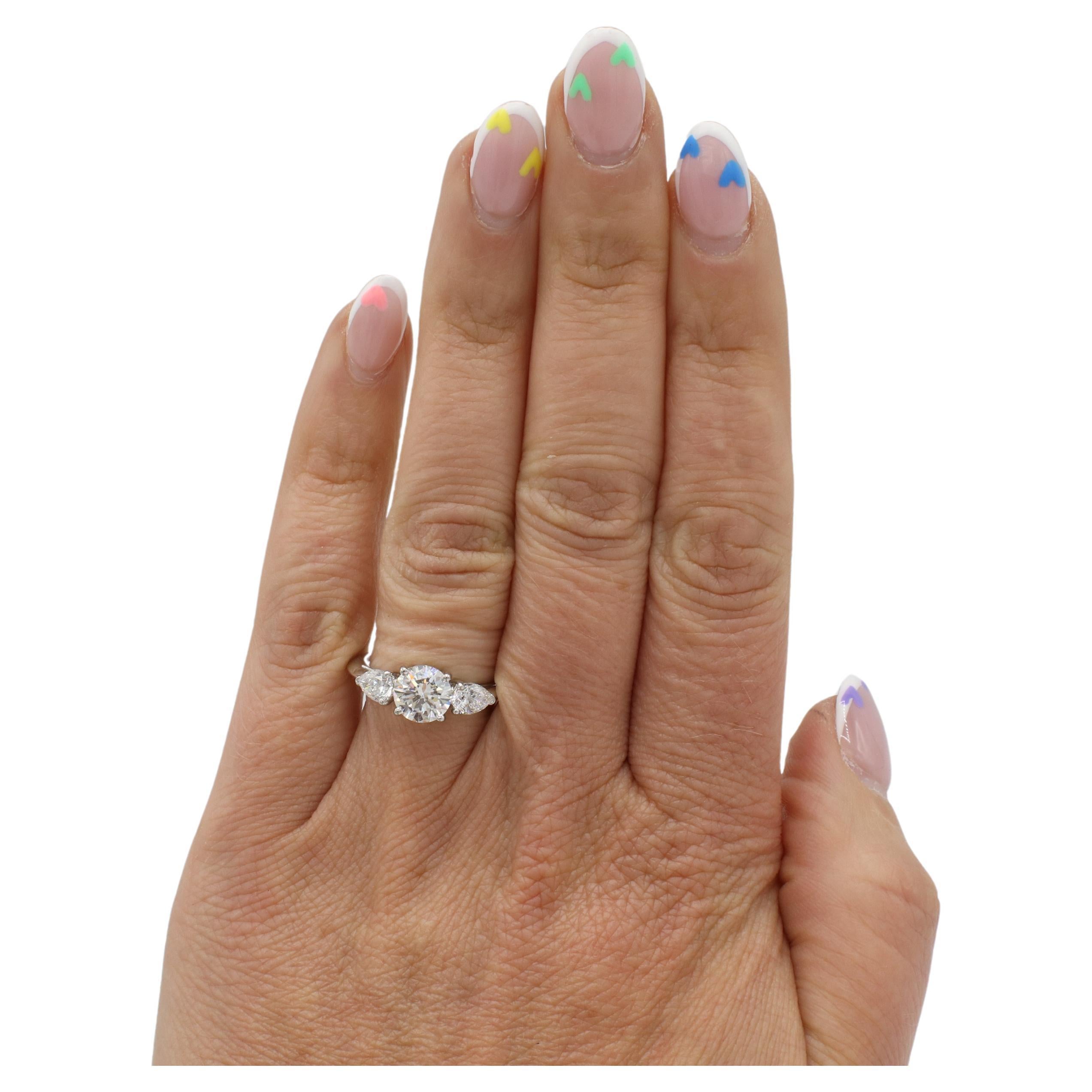 Tiffany & Co. 1.26 CT Round E VVS2 Natural Diamond Three-Stone Engagement Ring In Excellent Condition In  Baltimore, MD