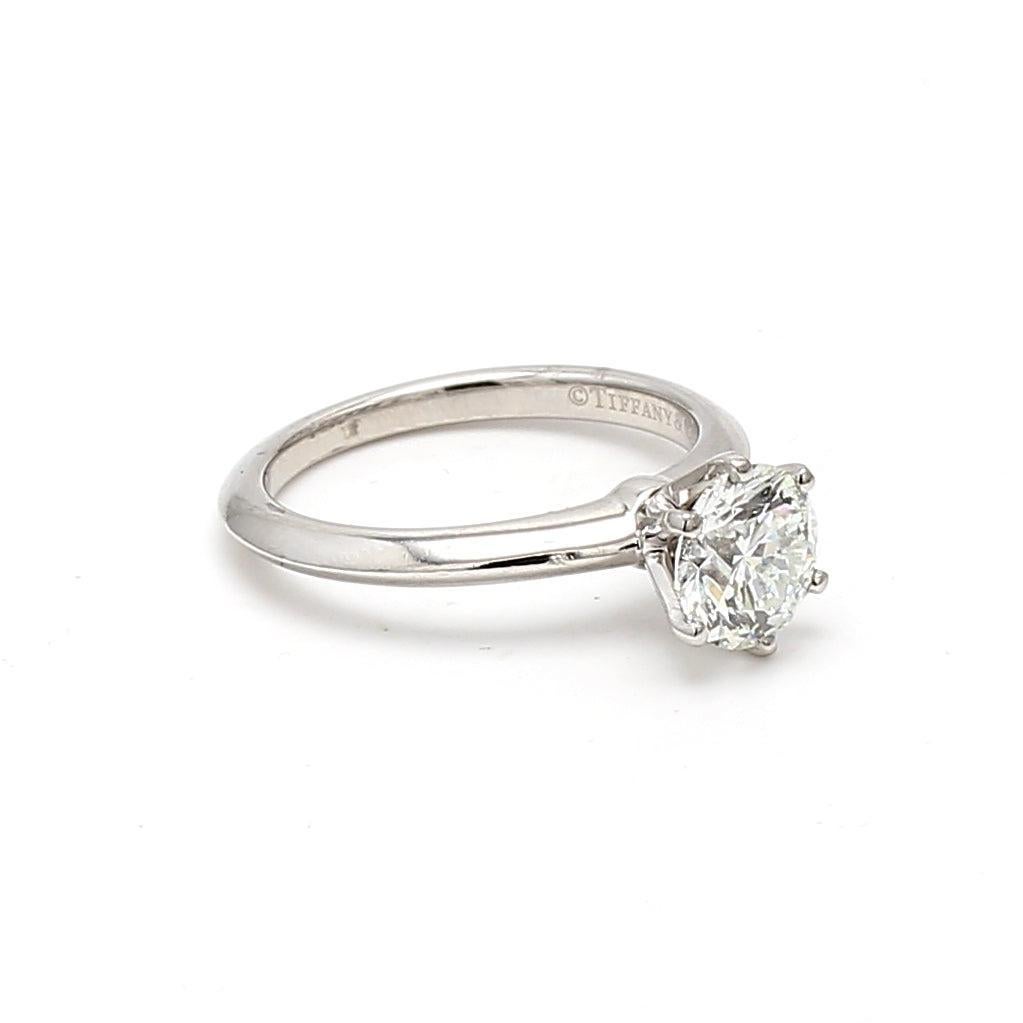 Designer:
Tiffany & Co


Title:
Tiffany & Co 1.30 Carat Round Brilliant H VS2 Diamond Platinum Engagement Ring


Style:
Engagement


Metal:
Platinum


Gemstone 1:
1.3 Carat Diamond


Number of Stones:
1


Color:
H


Clarity:
VS2


Shape:
Round