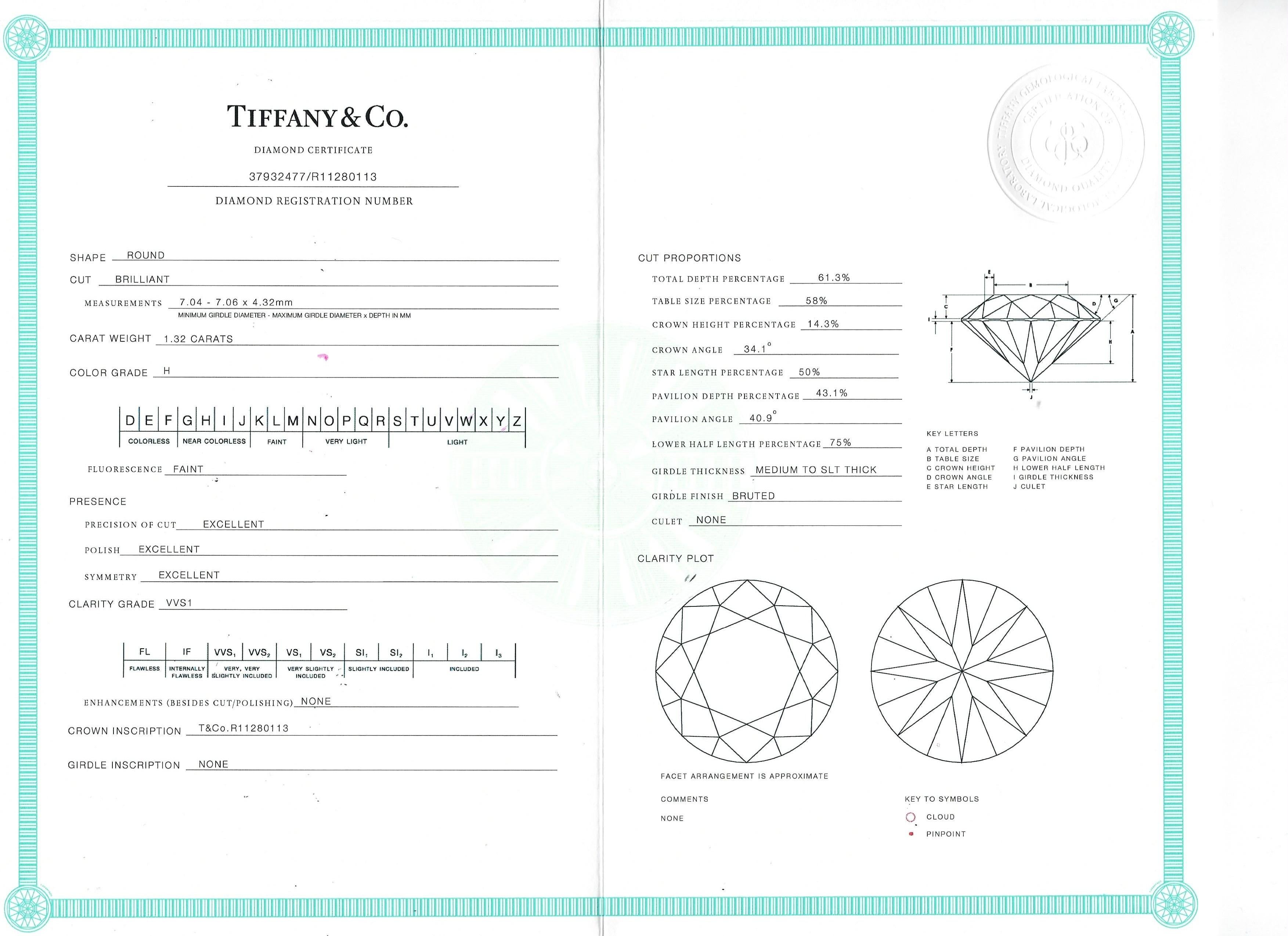 Tiffany & Co. 1.32 Carat Round Brilliant Ring with 1.43ctw Accent Diamonds 4