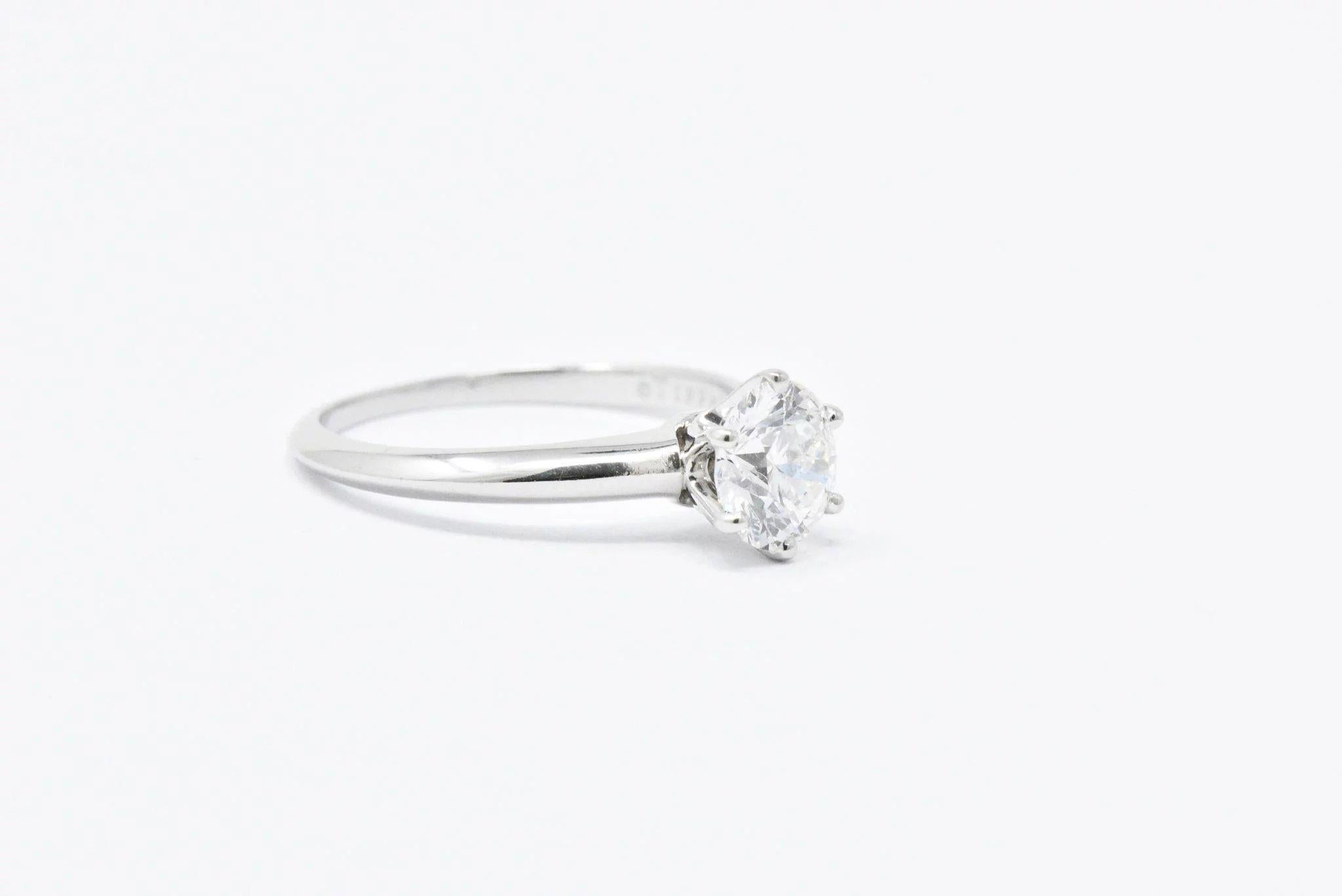 1.35 carat diamond ring on finger