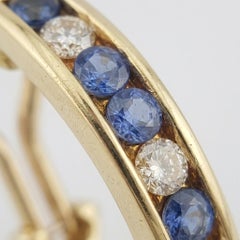 Tiffany & Co. 1.36 Carat Diamond Sapphire 18K Yellow Gold Omega Earrings