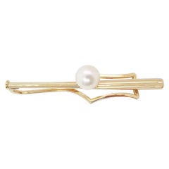 Tiffany & Co., pince à cravate baseball en or jaune 14 carats avec batte et perles
