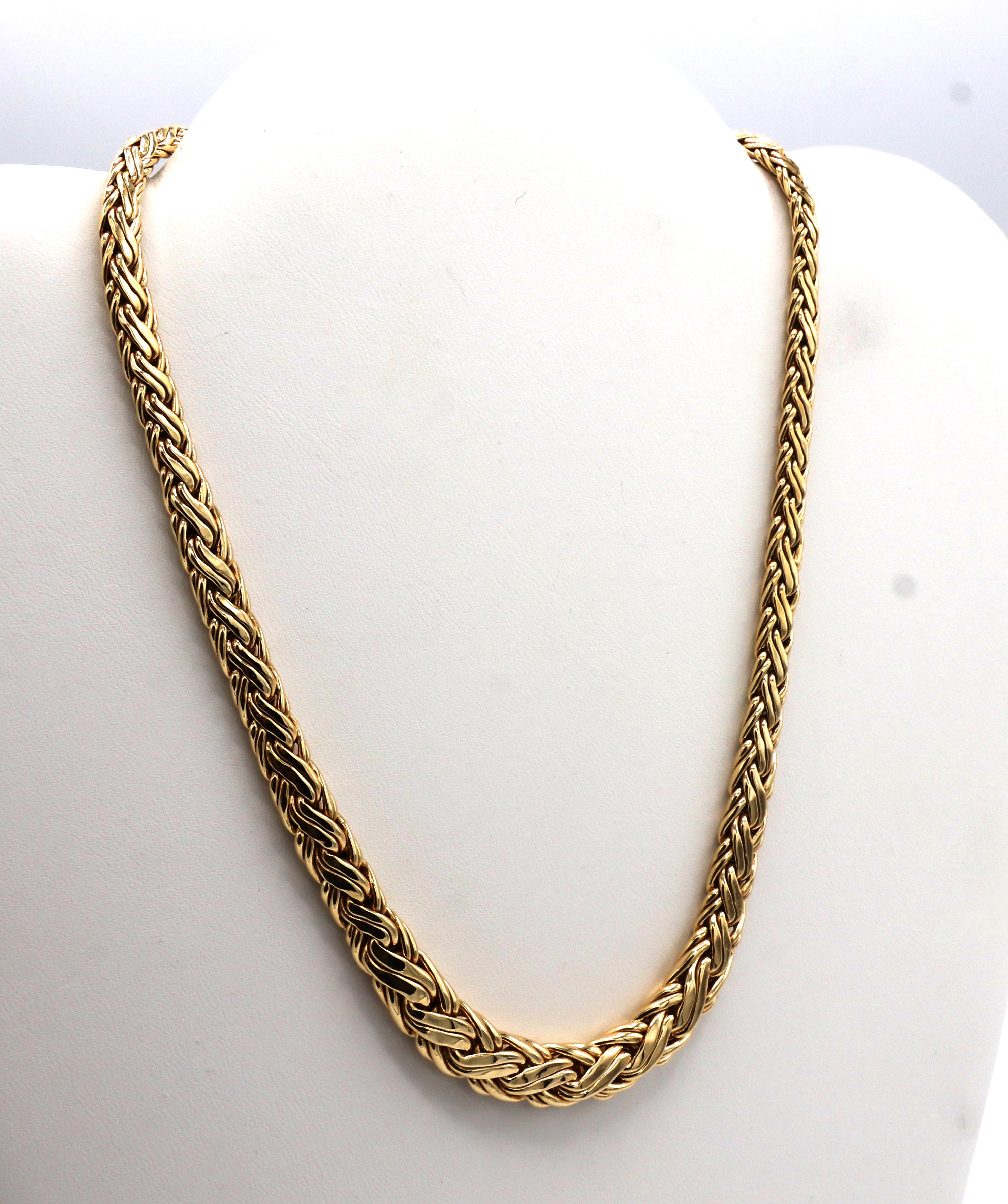 Tiffany & Co. 14 Karat Yellow Gold Graduated Woven Necklace 
Metal: 14k yellow gold
Weight: 29.9 grams
Length: 16.5 inches
Width: 4.5 - 9mm
Signed: Tiffany & Co. 585 