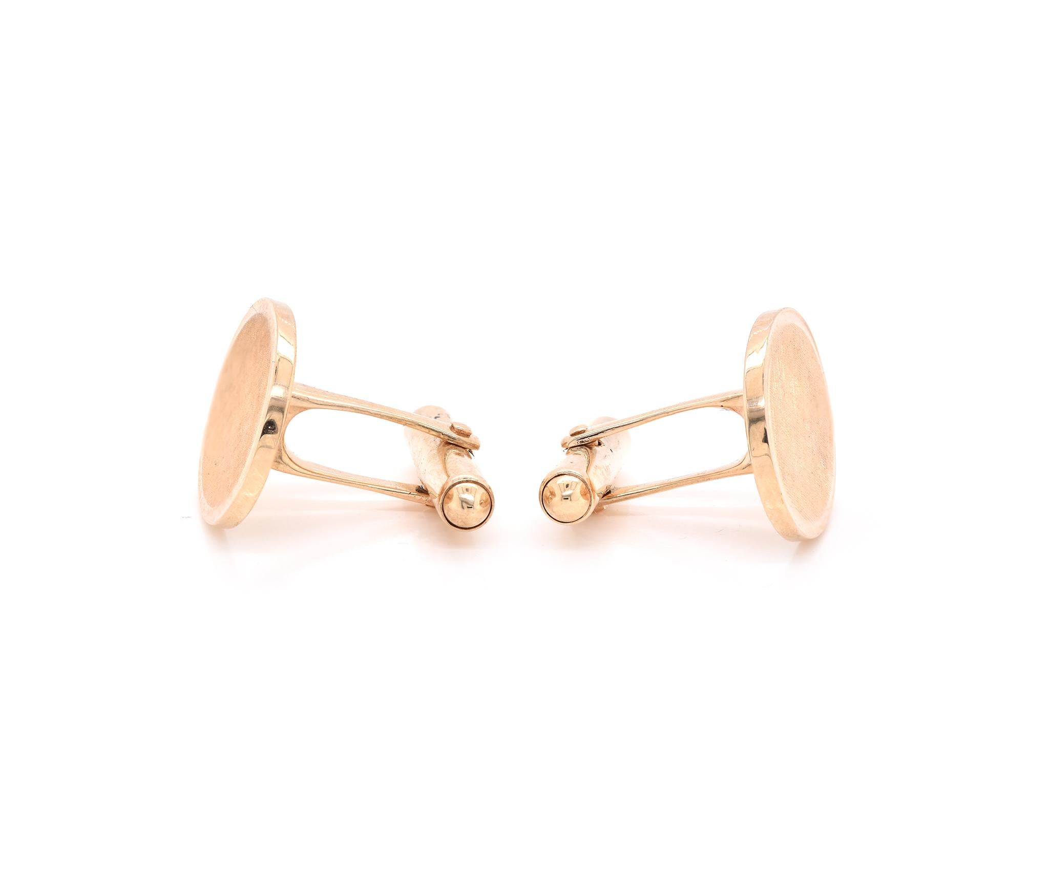 Designer: Tiffany & Co. 
Material: 14K yellow gold
Dimensions: cufflinks measure 20.75 X 16mm
Weight: 15.32 grams
