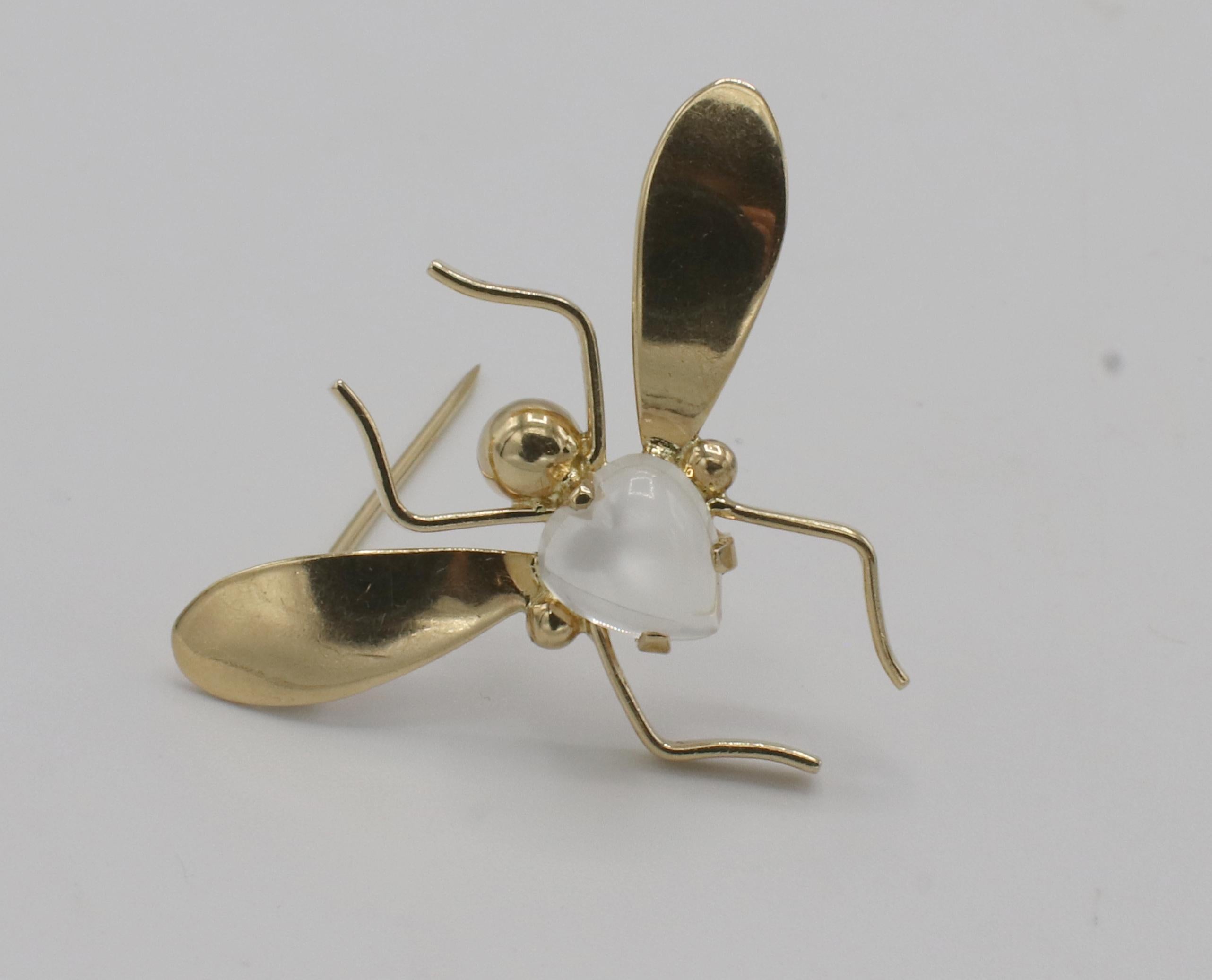 Tiffany & Co. 14 Karat Yellow Gold Moonstone Butterfly Pin Brooch
Metal: 14k yellow gold
Weight: 3.17 grams
Length: 25mm 
Width: 32mm
Moonstone: Heart cabochon, 7 x 7mm
