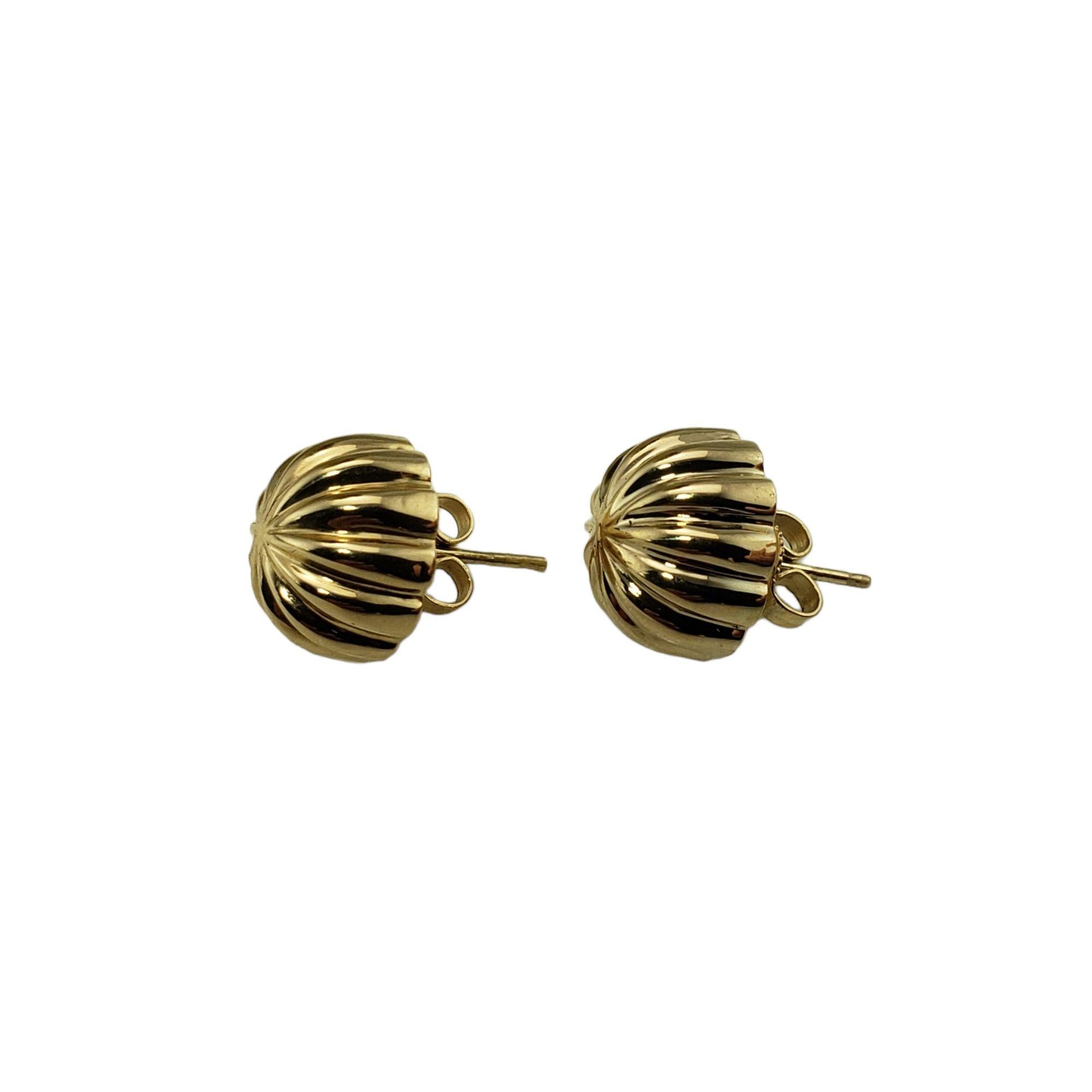Vintage Tiffany & Co. 14 Karat Yellow Gold Stud Earrings-

These stunning Tiffany earrings are crafted in beautifully detailed 14K yellow gold. Height: 6 mm.

Size: 11 mm

Weight: 1.8 dwt. / 2.8 gr.

Hallmark: Tiffany

*Earring backs are not