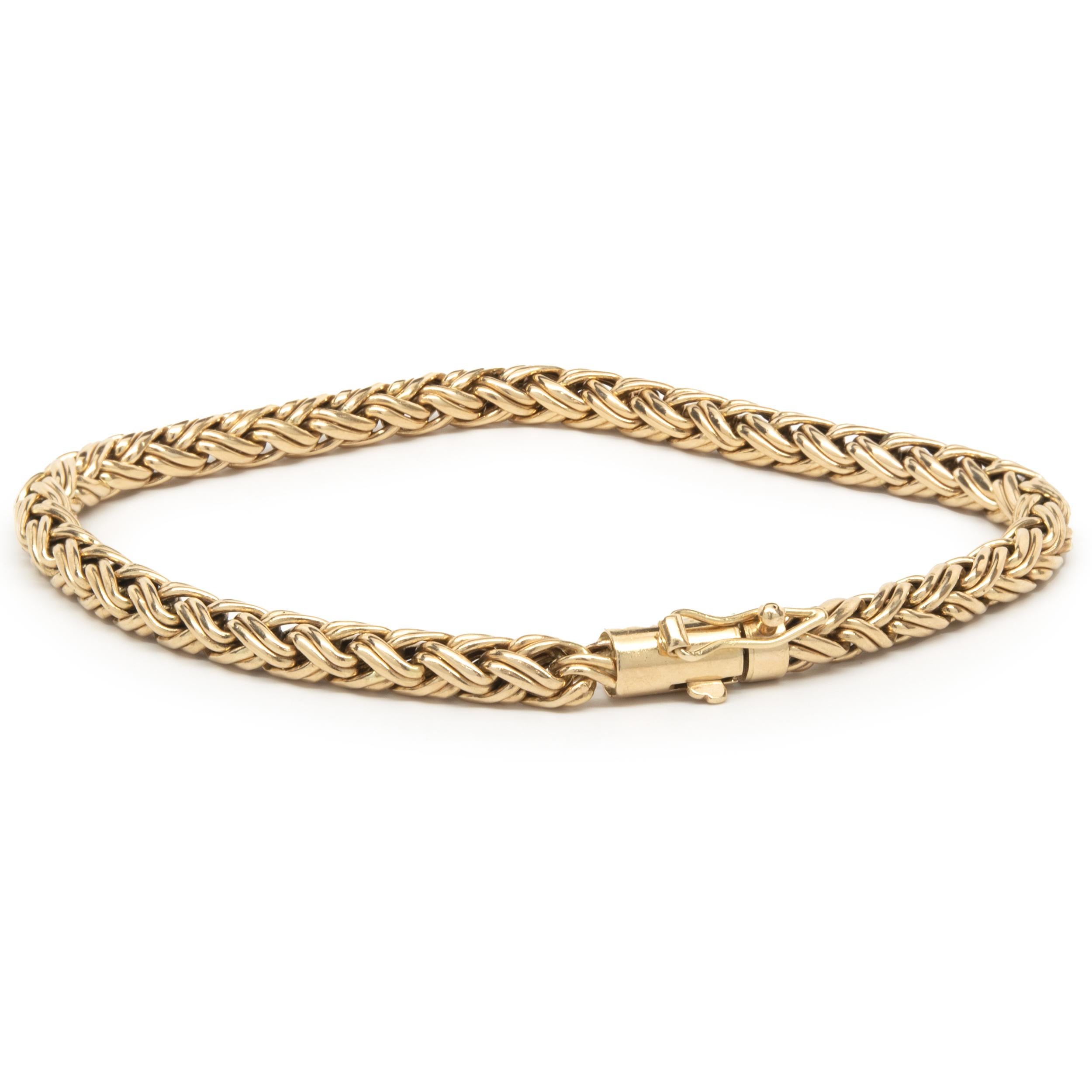 Material: 14K yellow gold
Dimensions: bracelet will fit up to a 7-inch wrist
Weight: 9.86 grams