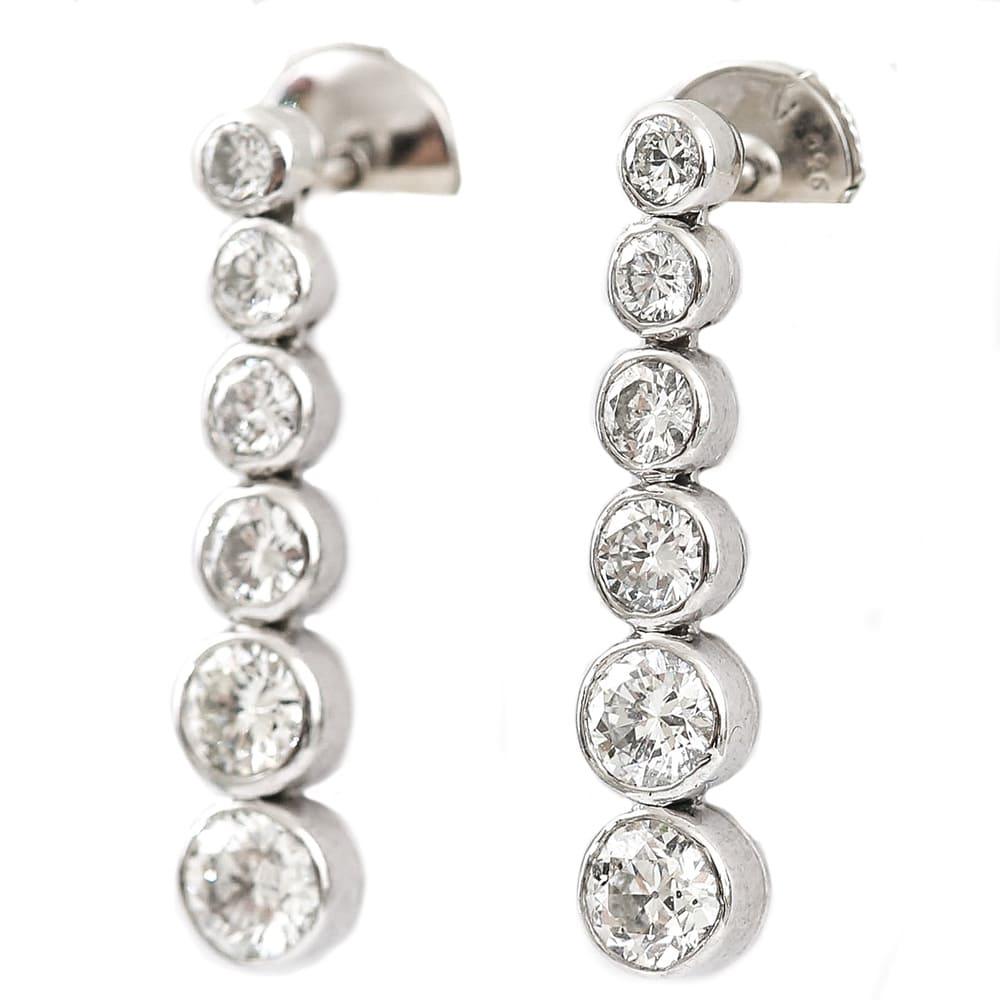 A super pair of earrings by Tiffany & Co from their Jazz Collection these pre-loved platinum diamond drop earrings have a total diamond weight of 1.42ct. 

Made with twelve graduated drops, utilizing superb sparkling brilliant cut diamonds, these