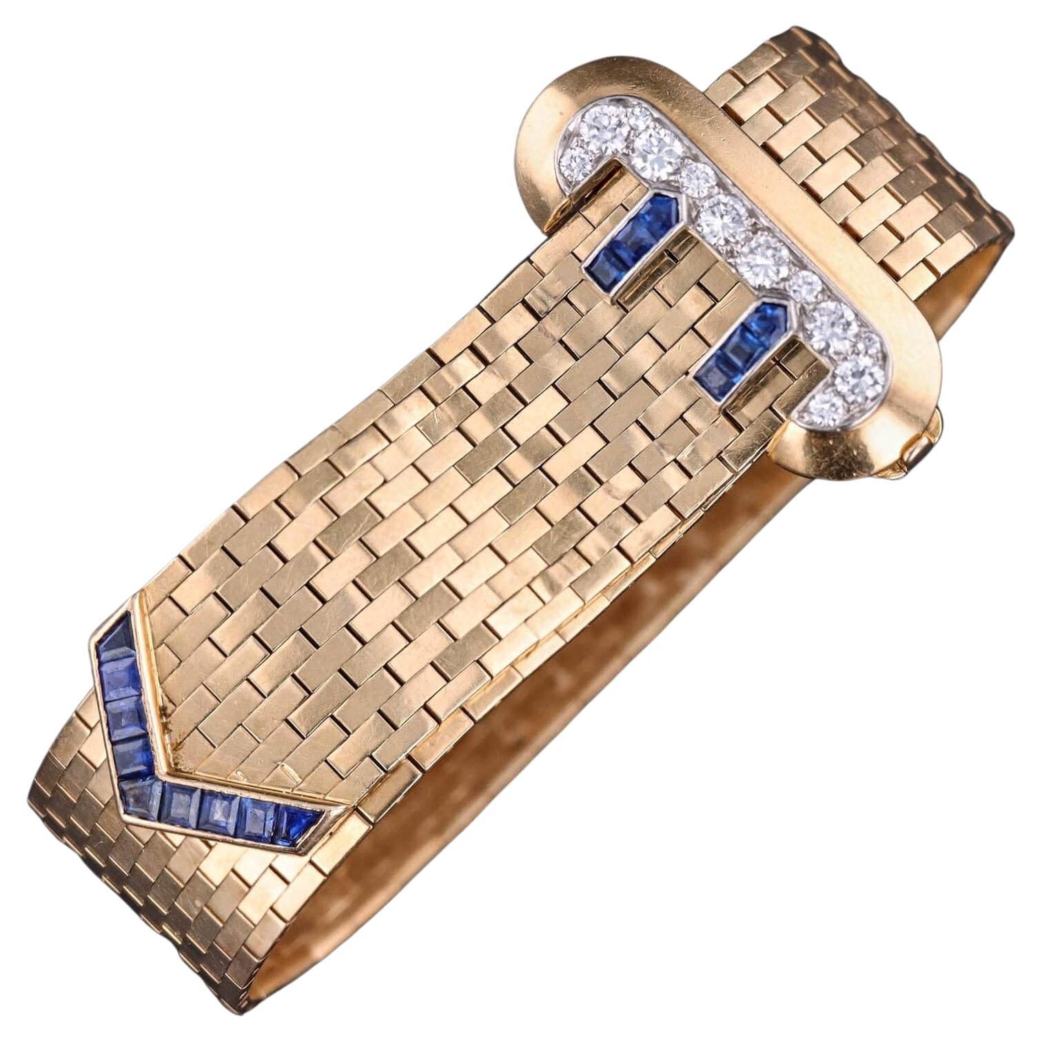 Pulsera tipo cinturón de Tiffany & Co. en oro de 14k con zafiros y diamantes, de alrededor de 1940