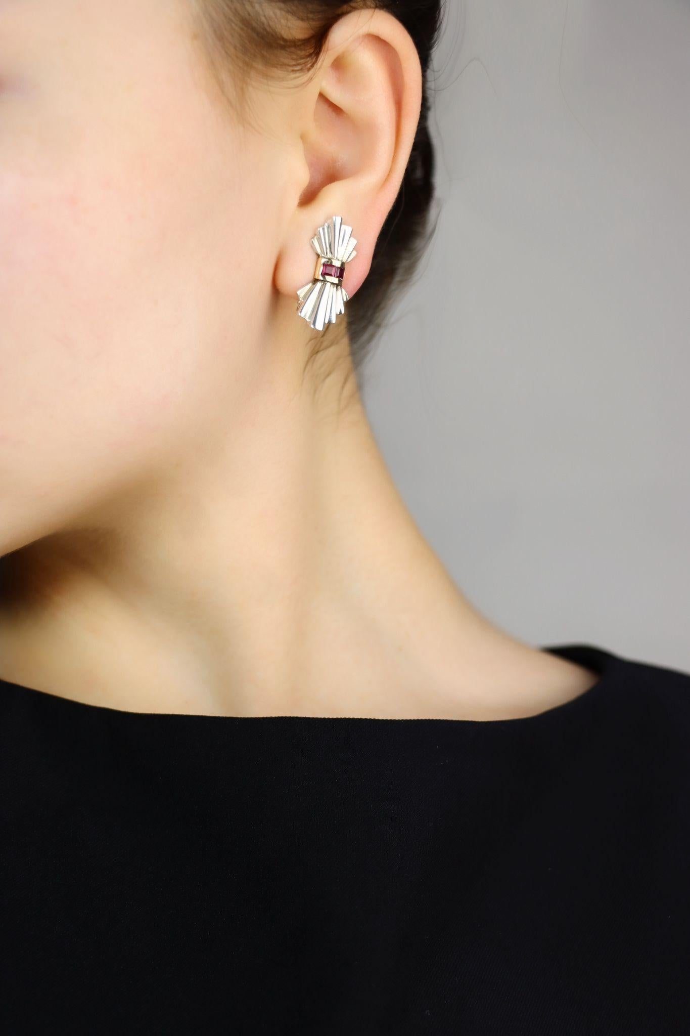 Tiffany & Co. 14K Gold Silver Ruby Bow Clip Earrings

Marked:
TIFF & Co. 
STR
14K

Approximate Dimensions:
2.5 cm (Length) 
1.3 cm (Width)
6.8 grams in weight.