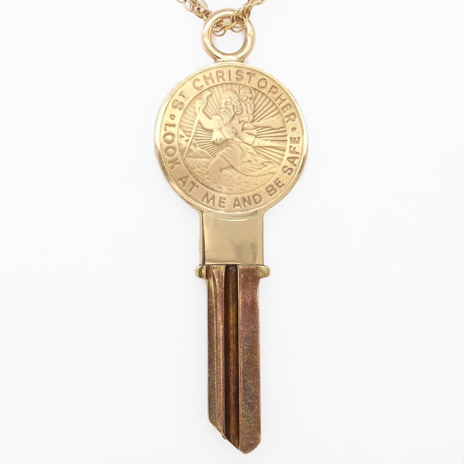 Tiffany & Co. 14K Gold St. Christopher Medallion Uncut Key Pendant In Good Condition In Philadelphia, PA