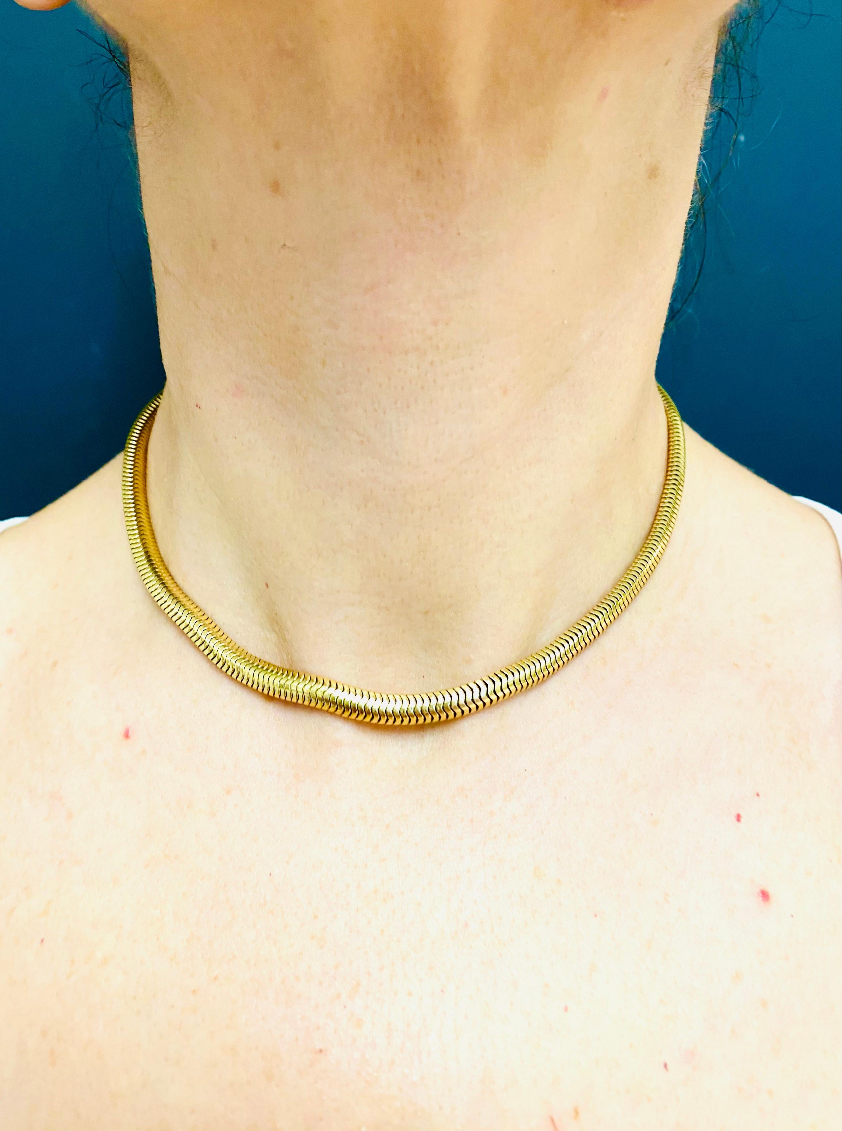 DESIGNER: Tiffany & Co.
CIRCA: 1990s
MATERIALS: 14k  Gold
WEIGHT: 39.7 grams
MEASUREMENTS: 15