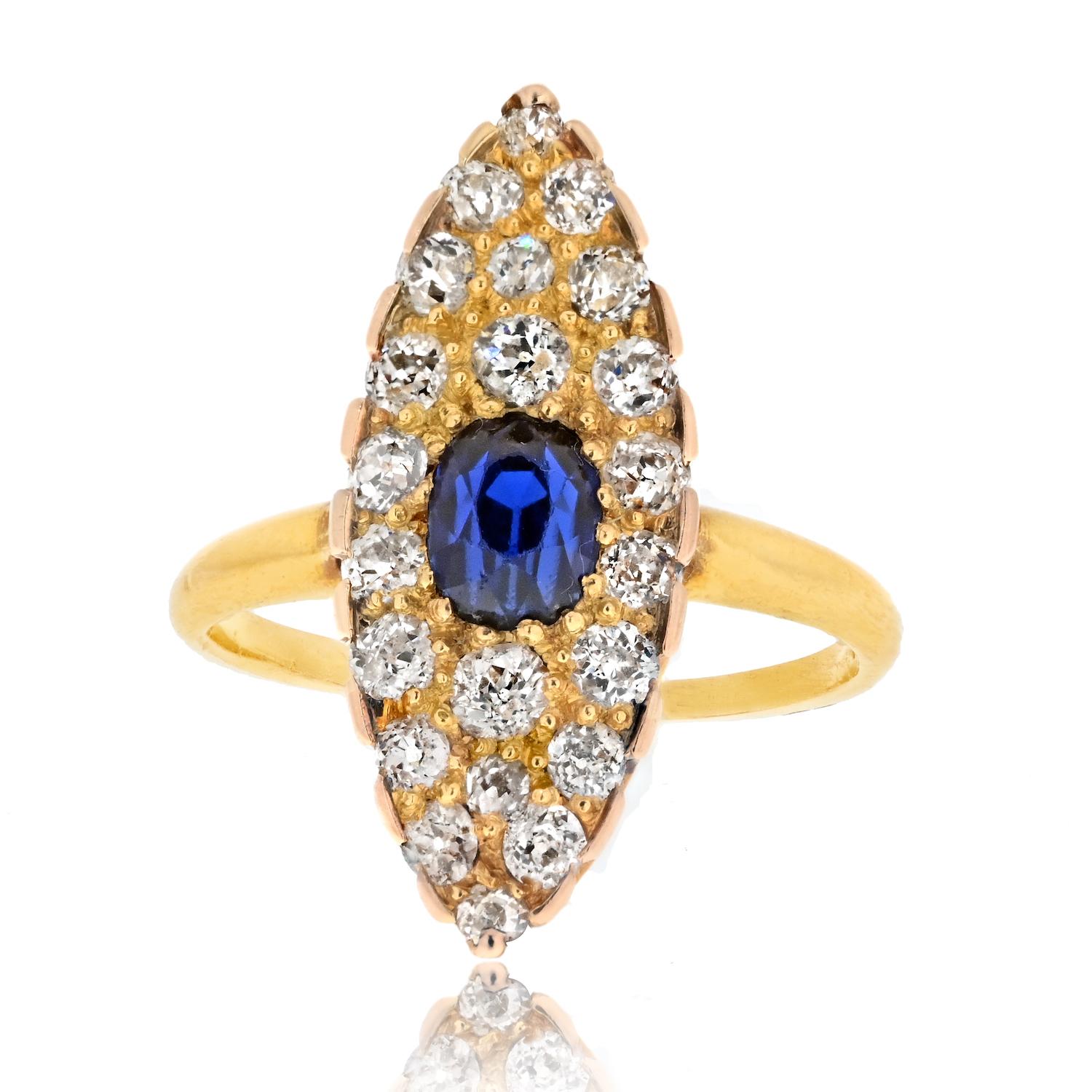 Adorn your finger with the timeless elegance of this Tiffany & Co. 14K Yellow Gold Burma Sapphire and Old Cut Diamond Navette Ring. This vintage piece, hailing from the early 1900s, exudes an air of refinement that has stood the test of time.

At