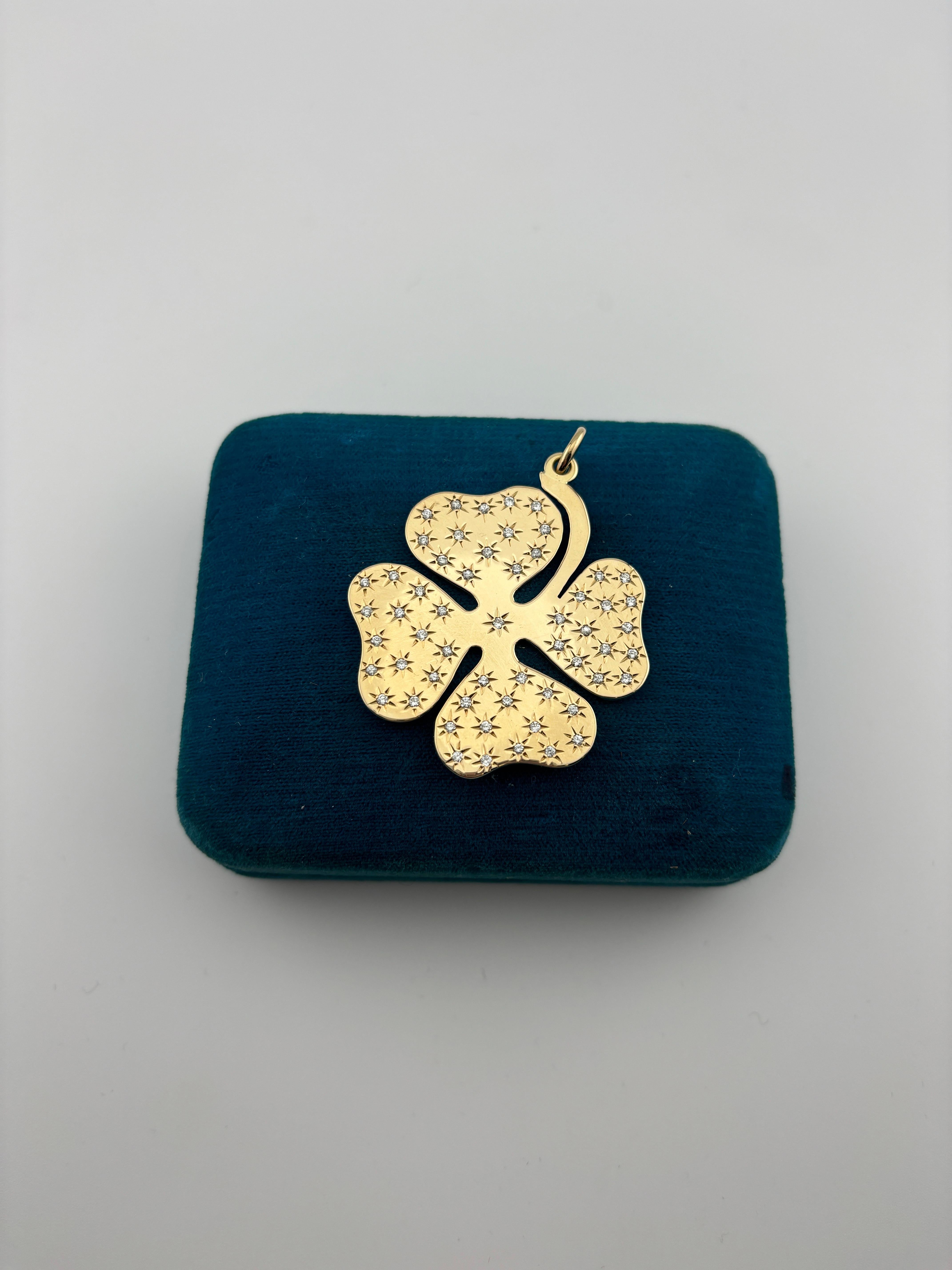 Beautiful Tiffany & Co. four leaf clover pendant. The four leaf clover is believed to bring good luck to its owner. The four leaves of a clover represent faith,  hope, love and luck.

Designer: Tiffany & Co.
Material: 14k yellow gold
Gemstone: