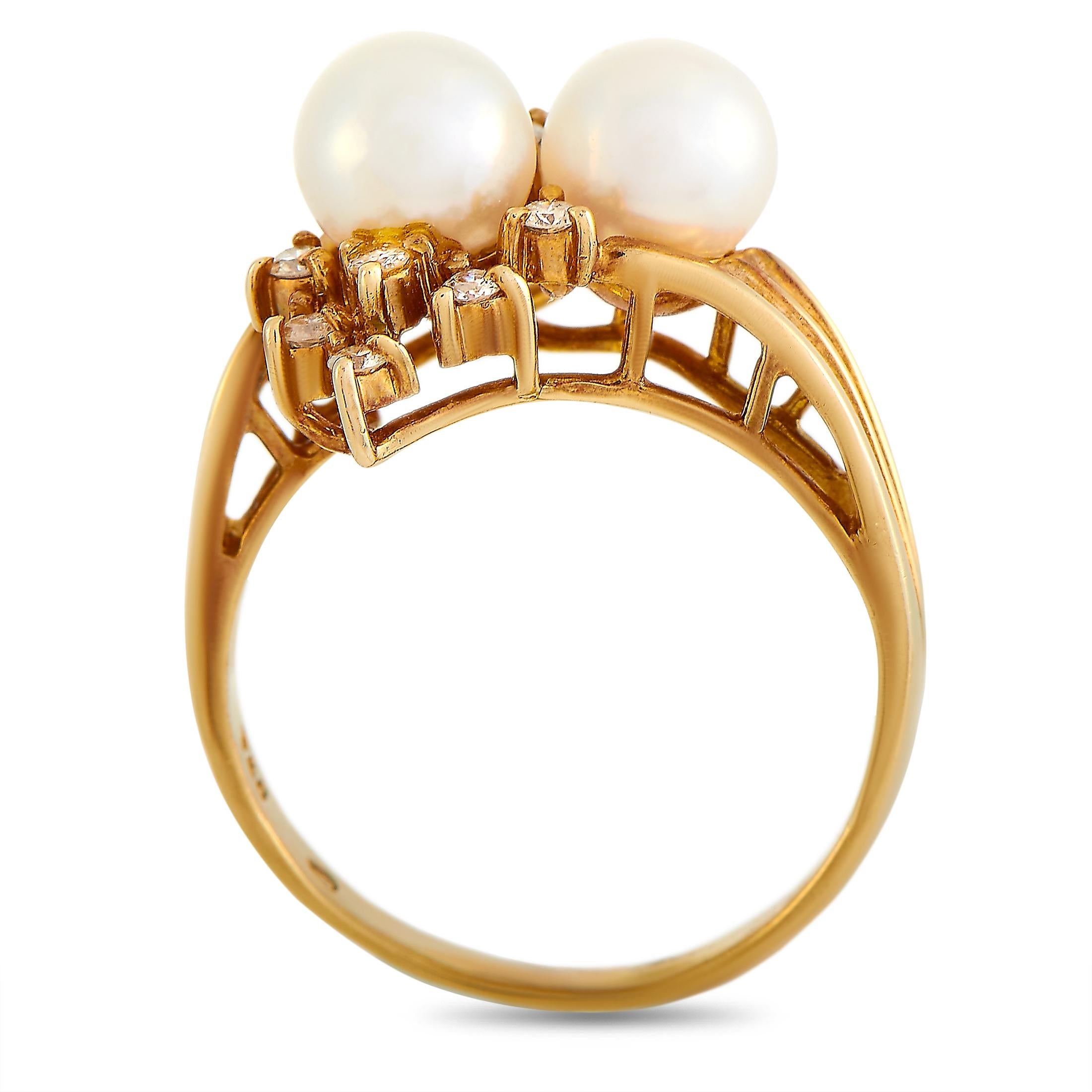 This Tiffany & Co. ring is made of 14K yellow gold and embellished with diamonds and pearls. The ring weighs 3.4 grams and boasts band thickness of 2 mm and top height of 10 mm, while top dimensions measure 15 by 15 mm.
 
 Offered in estate