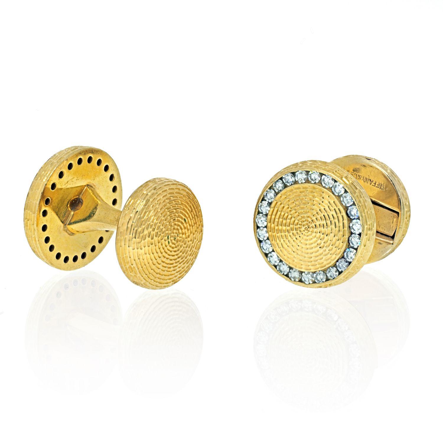 Tiffany & Co. Gold Diamond Cufflinks. 
Vintage 14K textured yellow gold Tiffany diamond cufflinks. These glamorous cufflinks are set with round brilliant diamond by the Iconic Tiffany & Co. circa 1950's. Approximate Measurements: Length 0.7