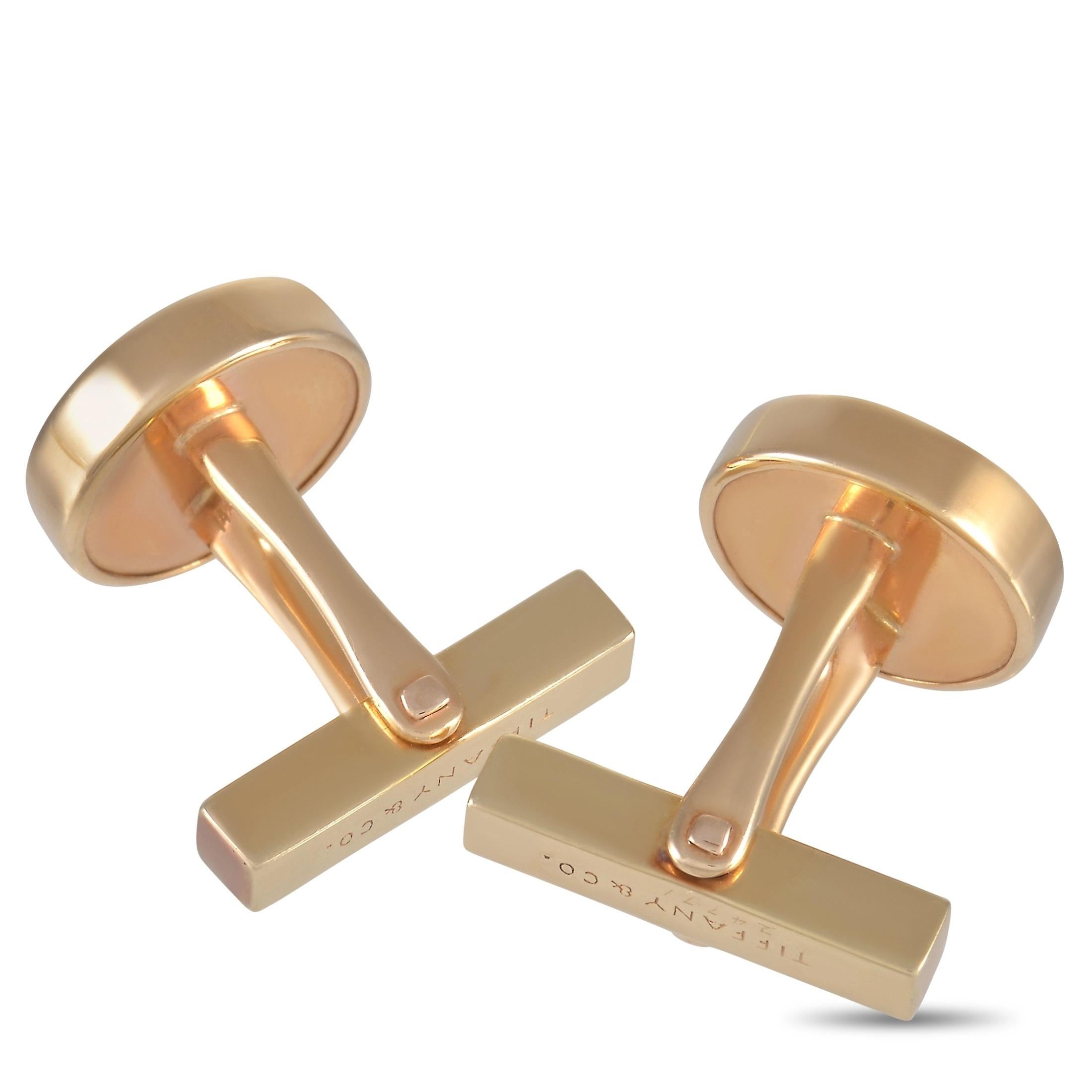  No suited look is complete without these luxurious, understated cufflinks from Tiffany & Co. Crafted from 14K Yellow Gold, the center of each one of these 0.5” round cufflinks includes a striking black Onyx stone. 
 
 This jewelry piece is offered