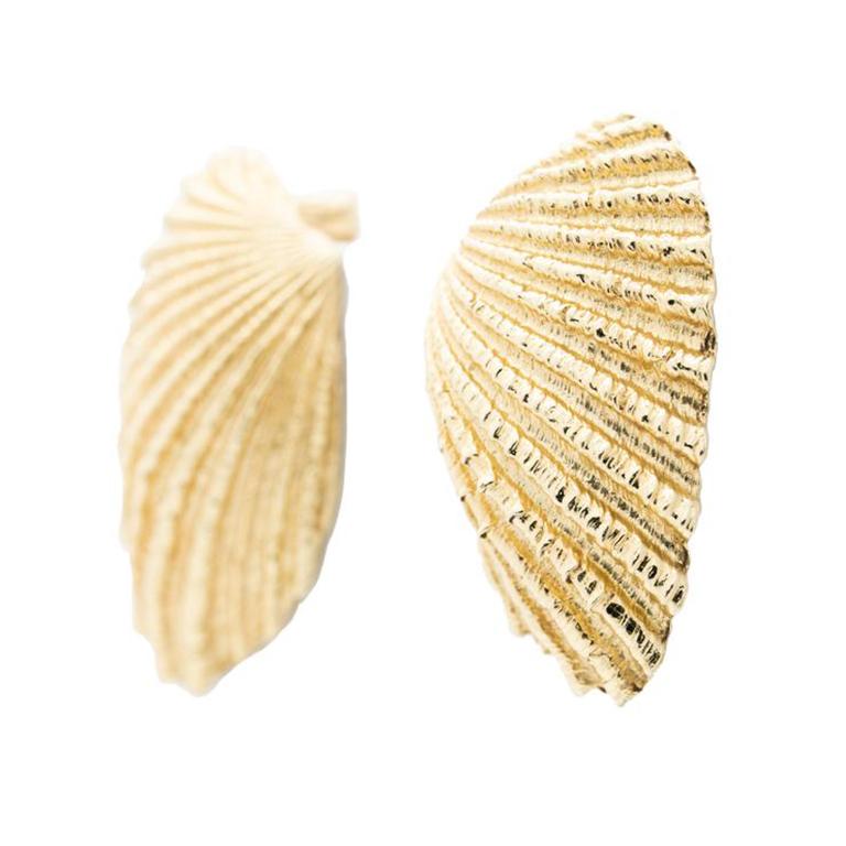 Vintage Tiffany & Co. 14k Yellow Gold Scallop Shell Earrings c.1960s

Additional Information:
Period: Vintage
Maker: Tiffany & Co. 
Year: 1960s
Material: 14k Yellow Gold
Closure: Clip-On, Convertible to Post
Weight: 16.47g
Length: 27.28mm
Width: