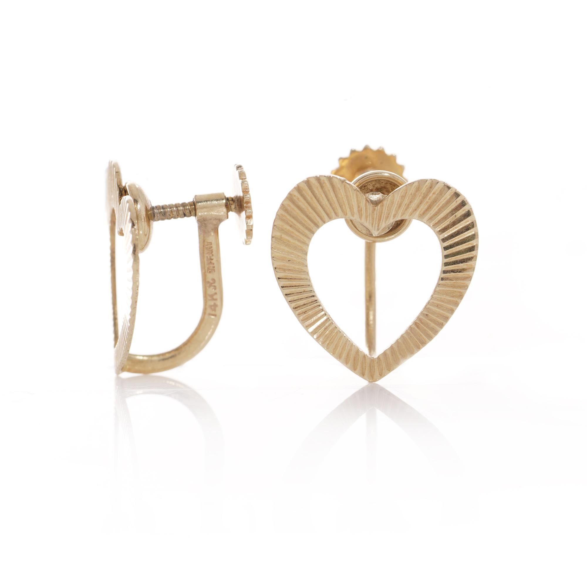 Women's Tiffany & Co. 14kt. gold pair of heart fluted design earrings with screw - backs For Sale