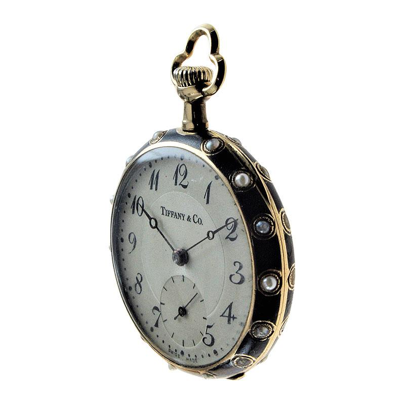 FACTORY / HOUSE: Longines for Tiffany & Co.
STYLE / REFERENCE: Opened Faced Pendant Style
METAL / MATERIAL: 14Kt. Solid Yellow Gold / Black Salted Enamel
CIRCA / YEAR: 1920's
DIMENSIONS / SIZE: 26mm
MOVEMENT / CALIBER: Manual Winding / 15 Jewels /