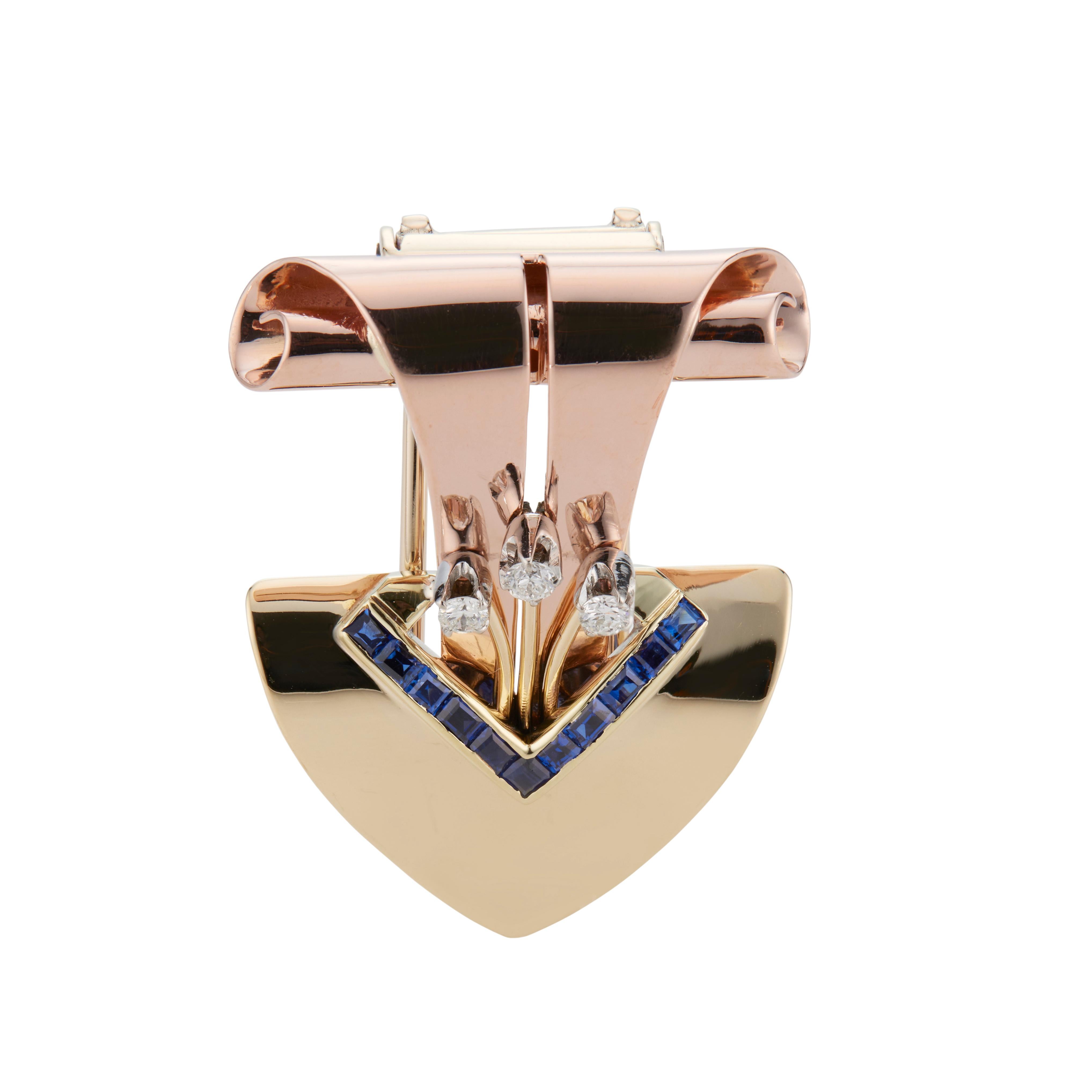 Tiffany & Co. sapphire and diamond brooch. 3 round diamonds set in 14k rose gold with 11 square cut sapphires in a 14k yellow gold bottom. The Tiffany & Co. logo is a bit worn but can seen. 

3 round diamonds, G VS approx. .15cts
11