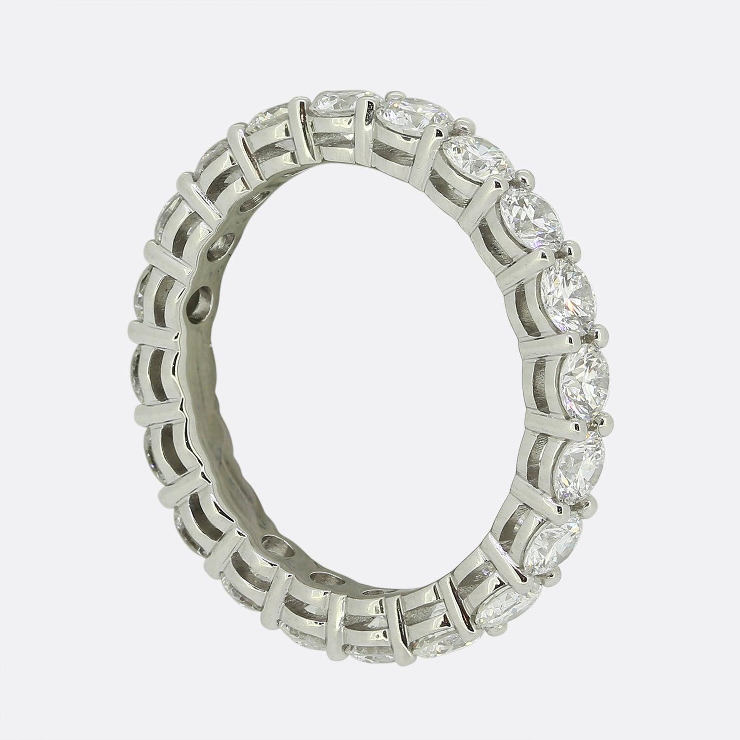 Here we have a platinum full eternity ring from Tiffany & Co. This piece forms part of the 'Embrace' collection and showcases twenty claw set, high quality round brilliant cut diamonds around the entirety of the band. 

Condition: Used