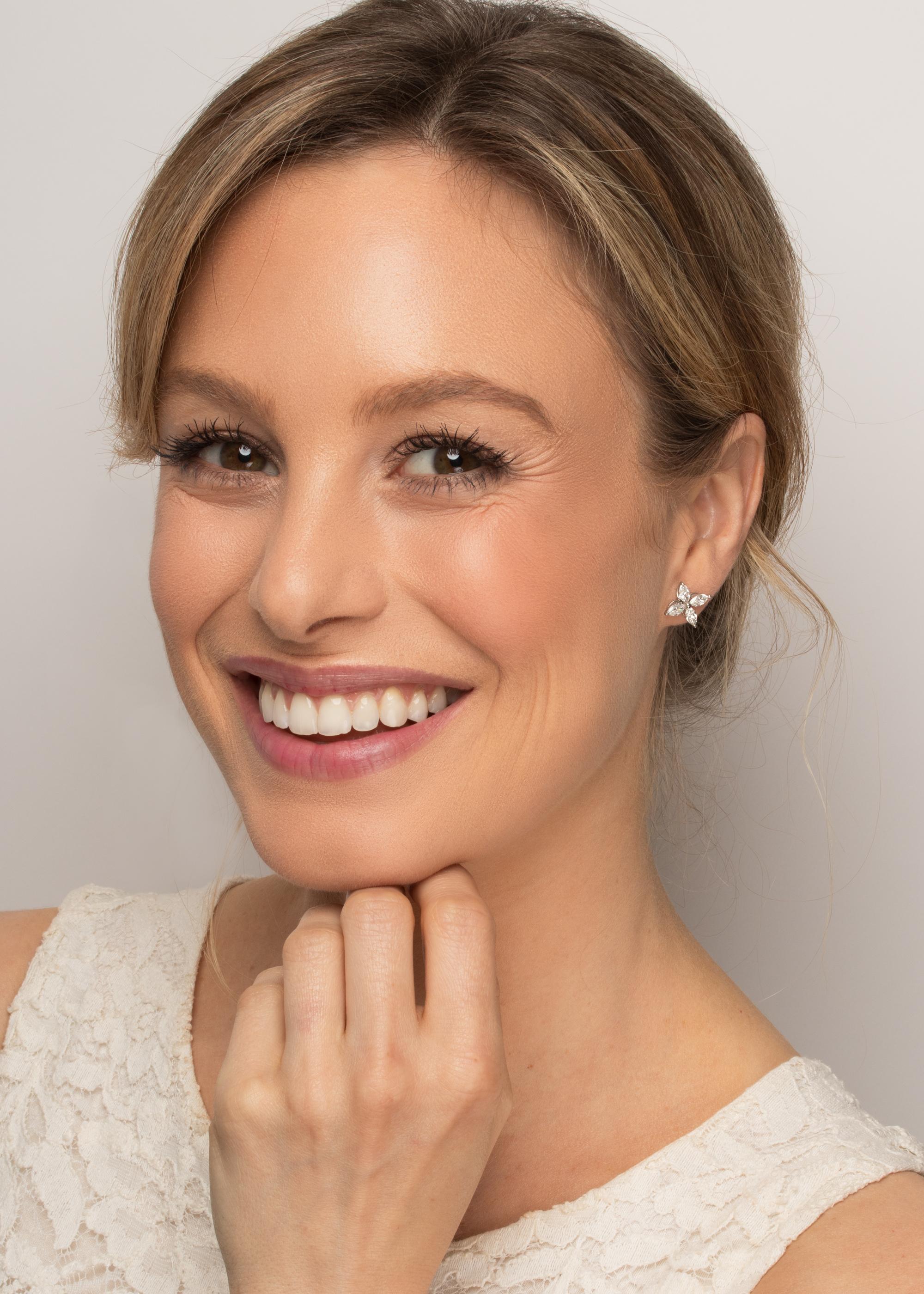 From Tiffany & Co.'s 'Victoria' collection, these earrings are truly stunning. Each earring features four marquise cut diamonds totalling 0.81 carat. As is expected from Tiffany & Co. The diamonds are of the highest quality, being graded E-F in