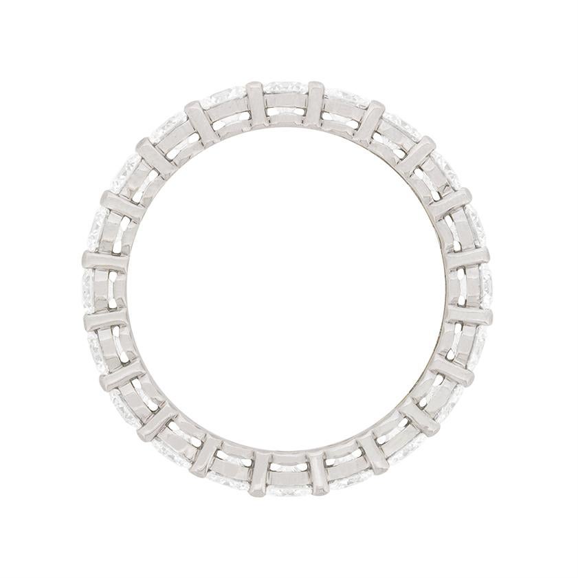This timeless Tiffany & Co. eternity ring glitters all the way around with 1.67 carats of round brilliant cut diamonds, which have been graded to a fine F colour and VS clarity.

These diamonds are classically-set in shared claw mountings, which are