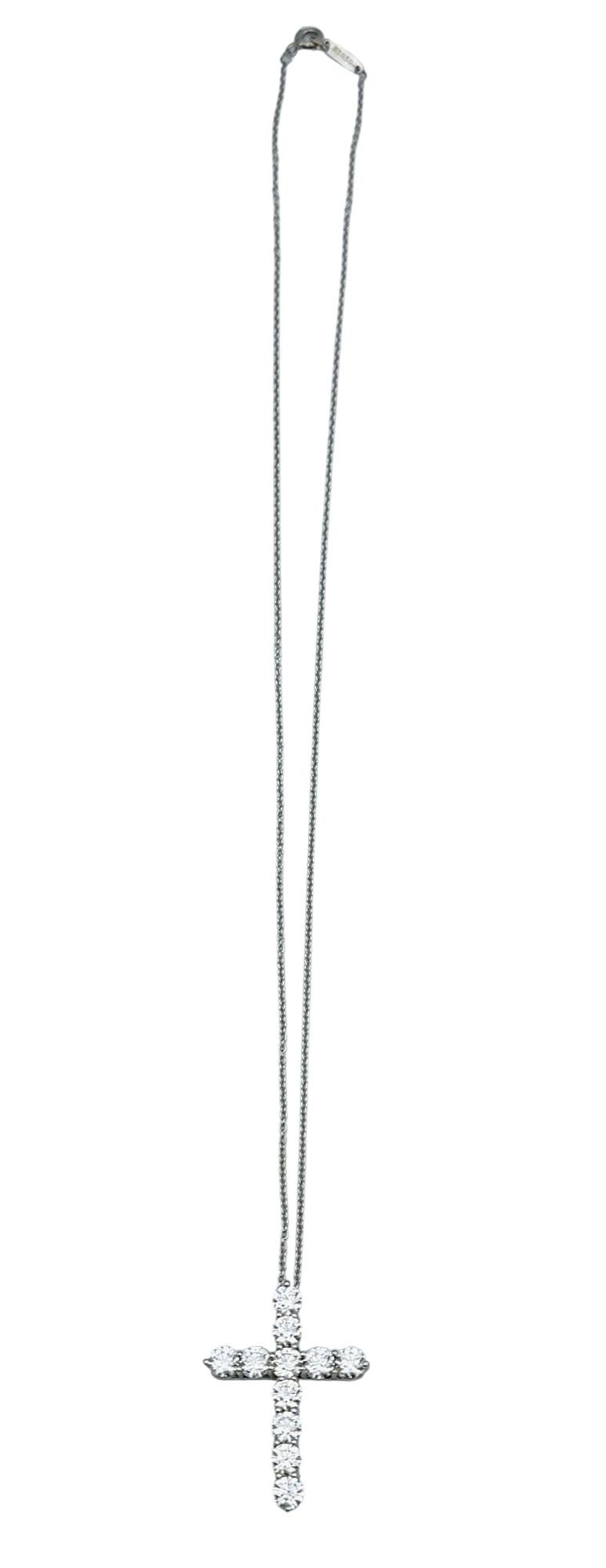 Elevate your collection with this authentic Tiffany & Co. cross pendant necklace, crafted in platinum. Designed with timeless elegance, the pendant features a striking arrangement of round brilliant diamonds, creating a luminous and sophisticated