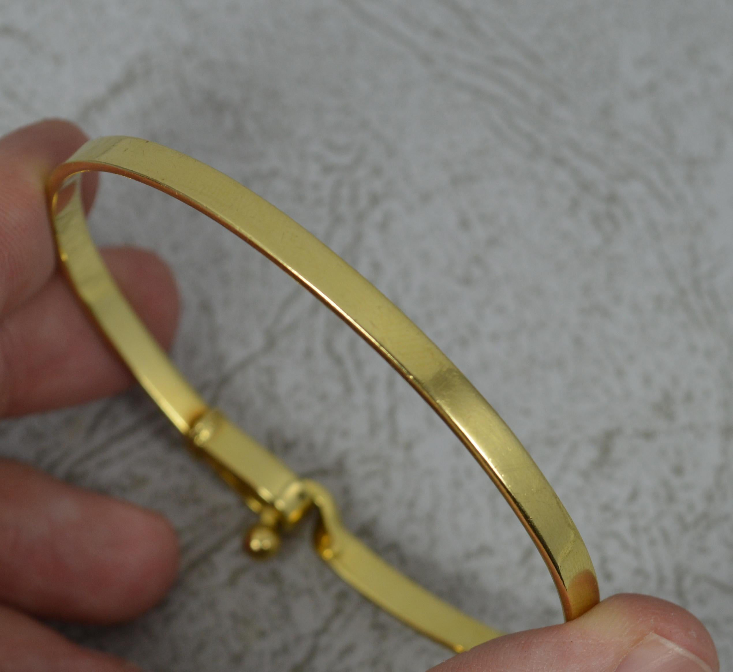 Tiffany & Co 18 Carat Gold Hook Eye Torque Bangle In Excellent Condition In St Helens, GB