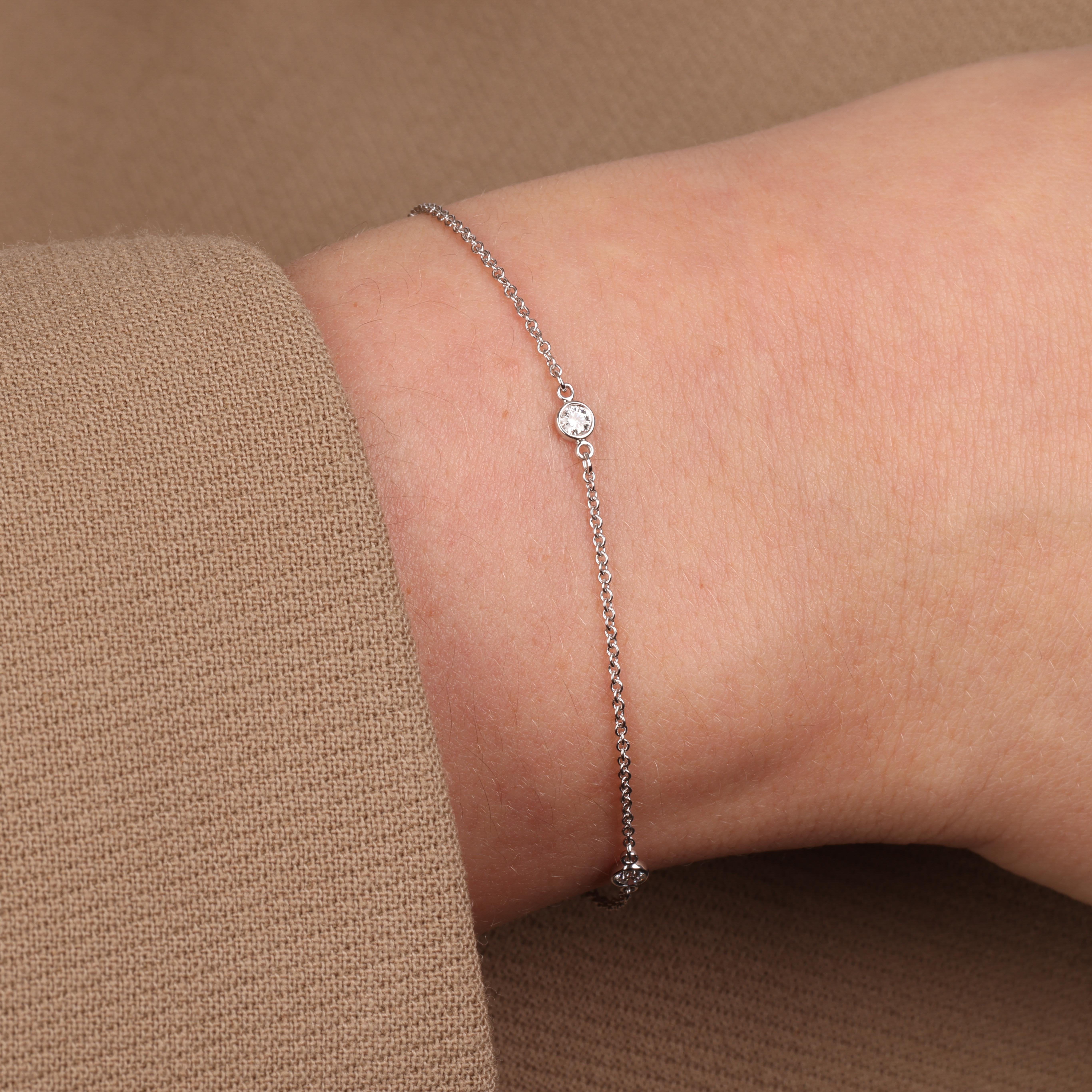 This bracelet by Tiffany & Co is from their Elsa Peretti Diamonds by the Yard collection and features 3 round brilliant cut diamonds set on a platinum chain. Accompanied by a Xupes presentation box. Our Xupes reference is J763 should you need to