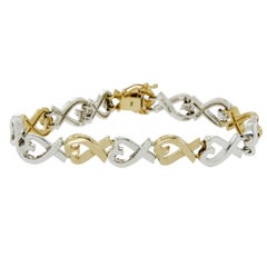 Tiffany & Co. 18 Karat Gold and 925 Silver Paloma Picasso Hearts X Bracelet