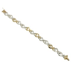 Tiffany & Co. 18 Karat Gold and 925 Silver Paloma Picasso Hearts X Bracelet