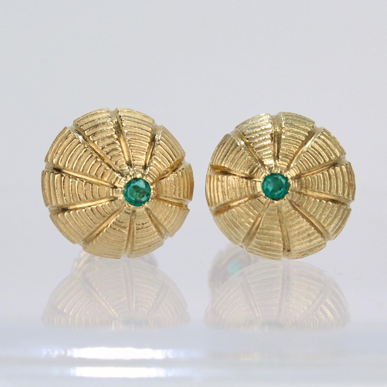 A fine pair of 'Taj Mahal' cufflinks in 18-karat gold by Jean Schlumberger for Tiffany & Co.

Each set with small emeralds to the front and reverse.

Found in a Rhinebeck, NY estate, the cufflinks still remarkably retain their original box. The box