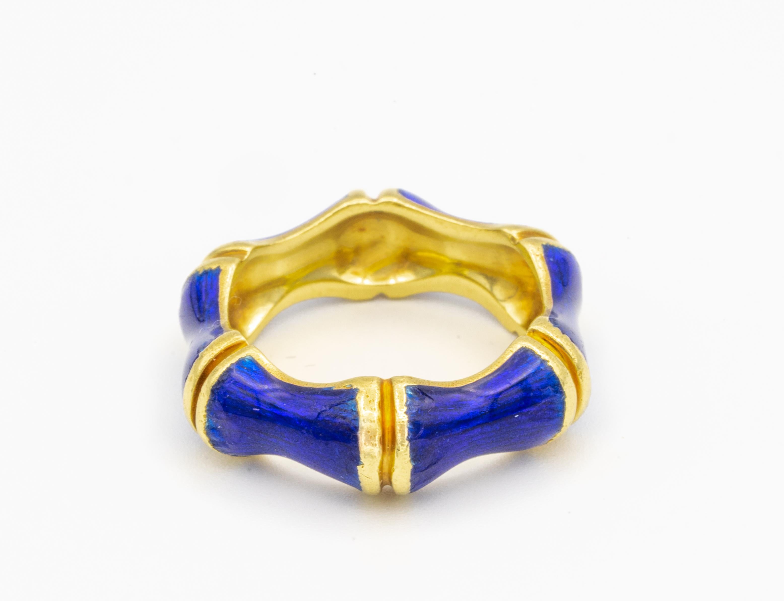 Tiffany & Co. 18k Gold and Enamel Bamboo ring , Circa 1960's -  
Brand: Tiffany & Co. 
Ring Size 6.5 
Width: 7.0 mm 
Signed: TIFFANY  
Stamped: 18K  
Condition: Enamel in excellent condition, consistent with age.   

“ Free overnight delivery is