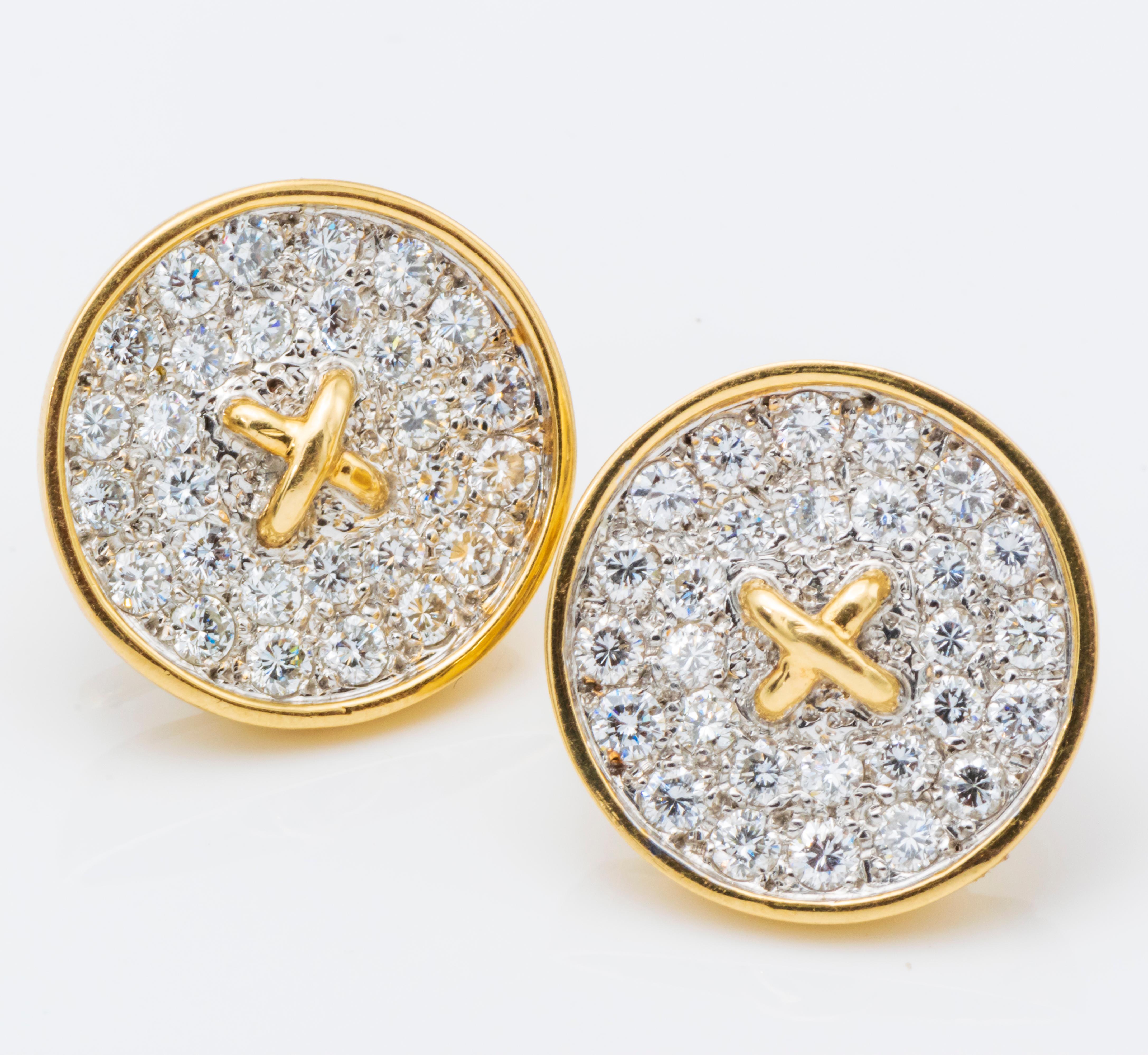 Tiffany & Co Button Motif earrings from 1940's in excellent condition

Total Diamond Weight - 3CT  ,   Color  clarity - D-E  VS
Dimension - 0.75 inches internal diameter
Weight - 13.9 gram