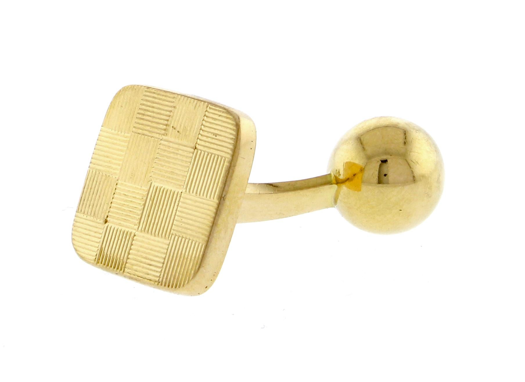 From Tiffany & Co., a handsome pair  18 karat Gold Cufflinks.  ½ inch square 14.2 grams