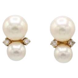 Tiffany & Co. 18 Karat Gold Cultured Pearl & Natural Diamond Drop Stud Earrings 
Metal: 18k yellow gold
Weight: 2.94 grams
Pearls: 4 cultured pearls, 5-6.5mm
Backs: Push backs
Signed: Tiffany & Co. 750 T&Co.
Diamonds: Approx. 04 CTW round natural