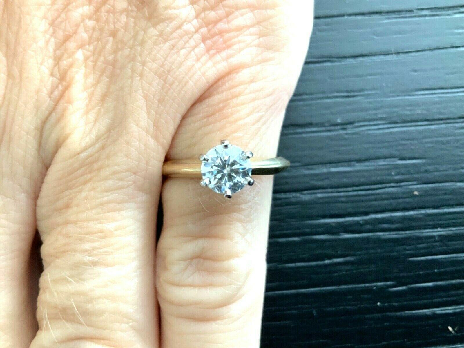 Tiffany & Co. 18 Karat Gold Diamond .79 Carat Round Ring G VS1 3 Excellent In Excellent Condition In Middletown, DE